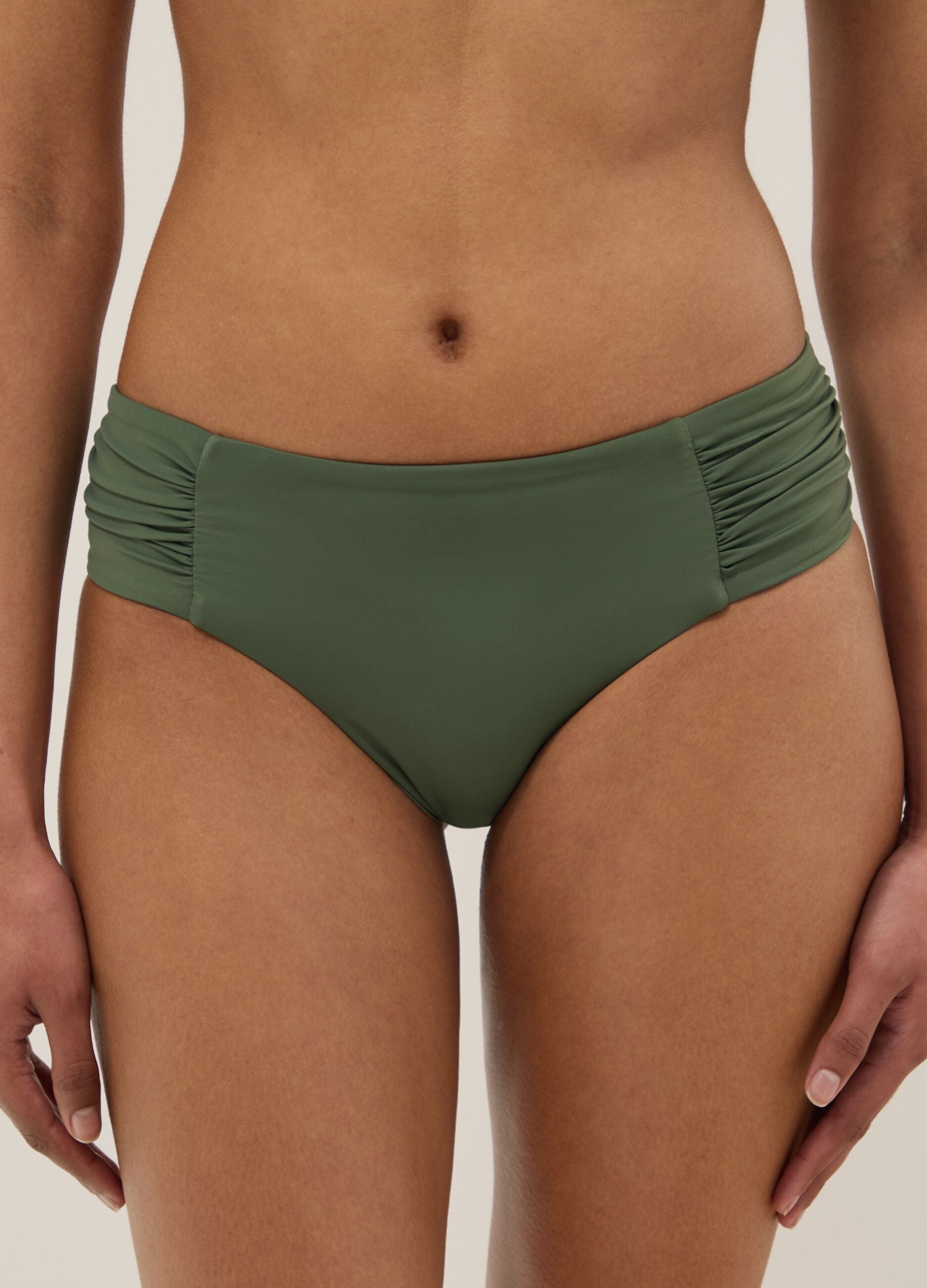 Green stretch swim briefs with side ruching