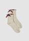 Beige organic cotton-blend socks with bow_0