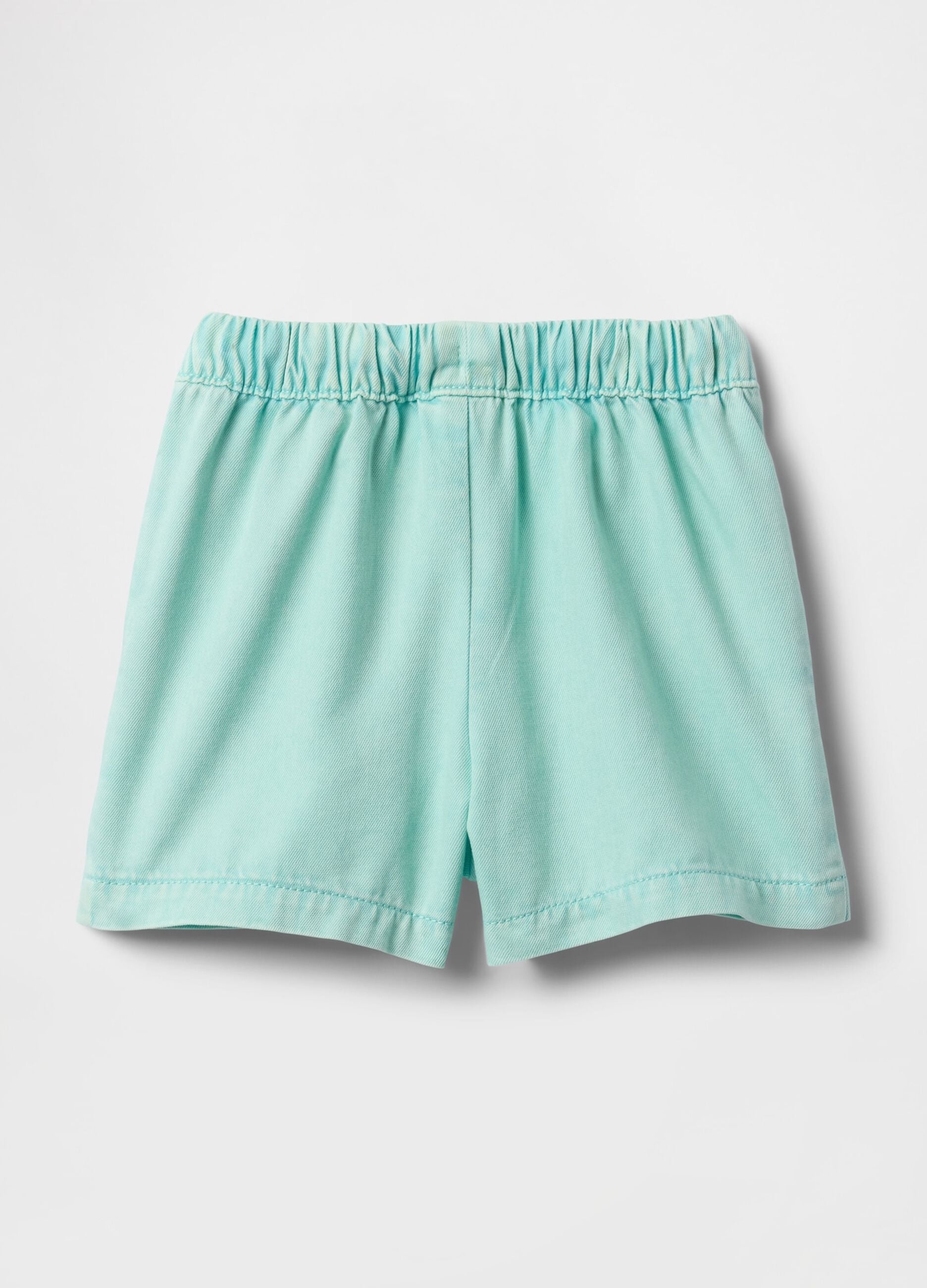 Light blue cotton girl's shorts with drawstring