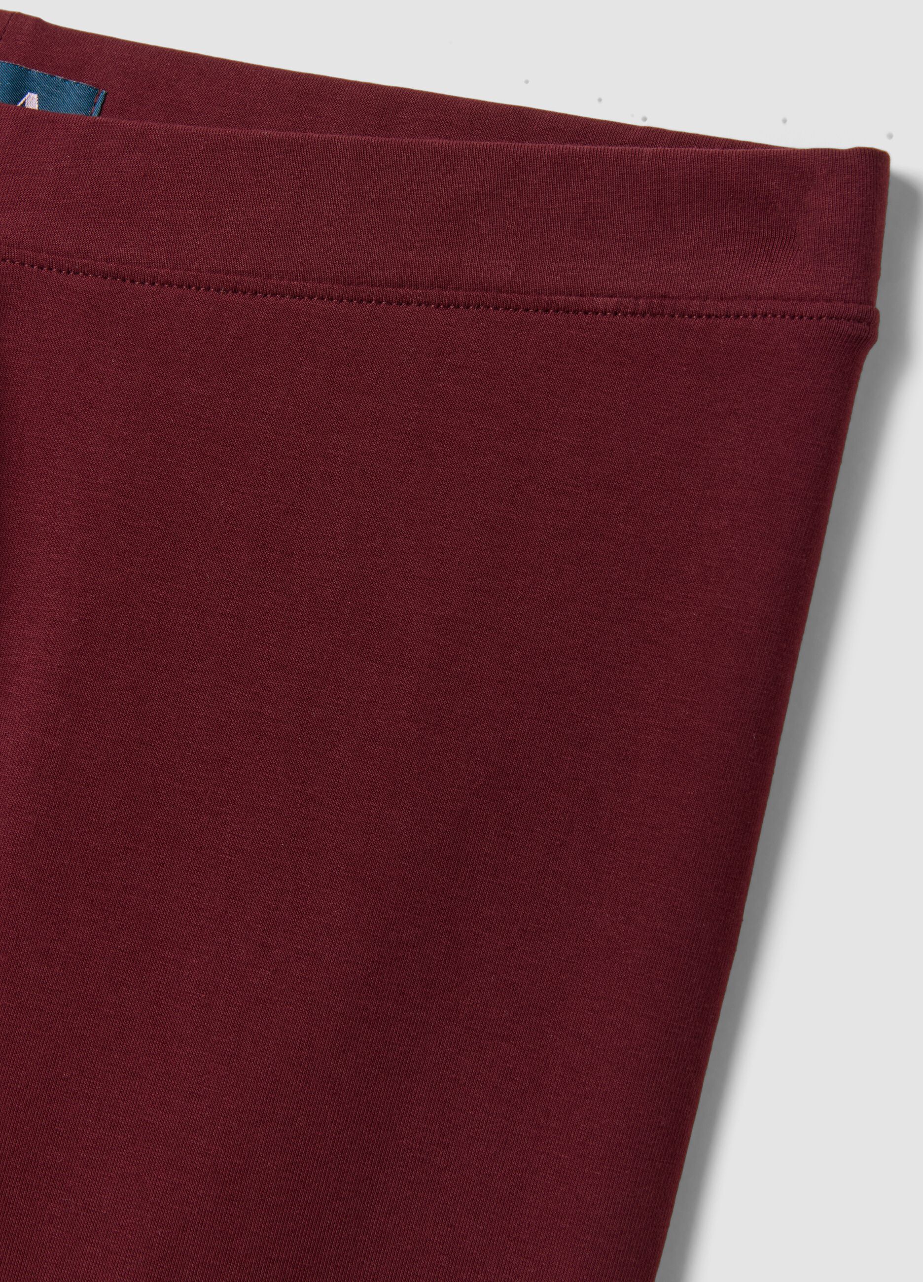 Red flared leggings in stretch cotton
