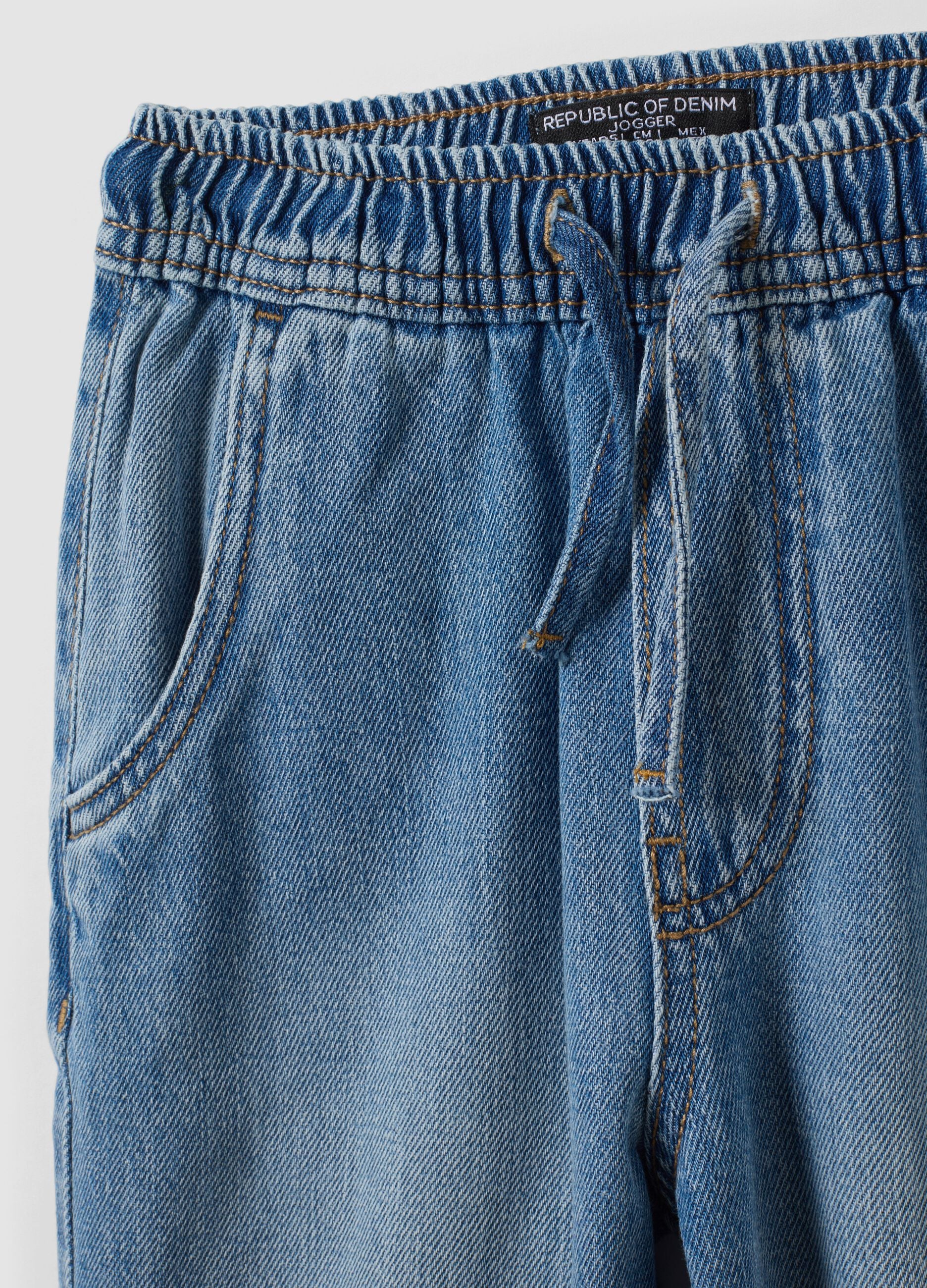 Light blue cotton and viscose blend joggers with drawstring for boys