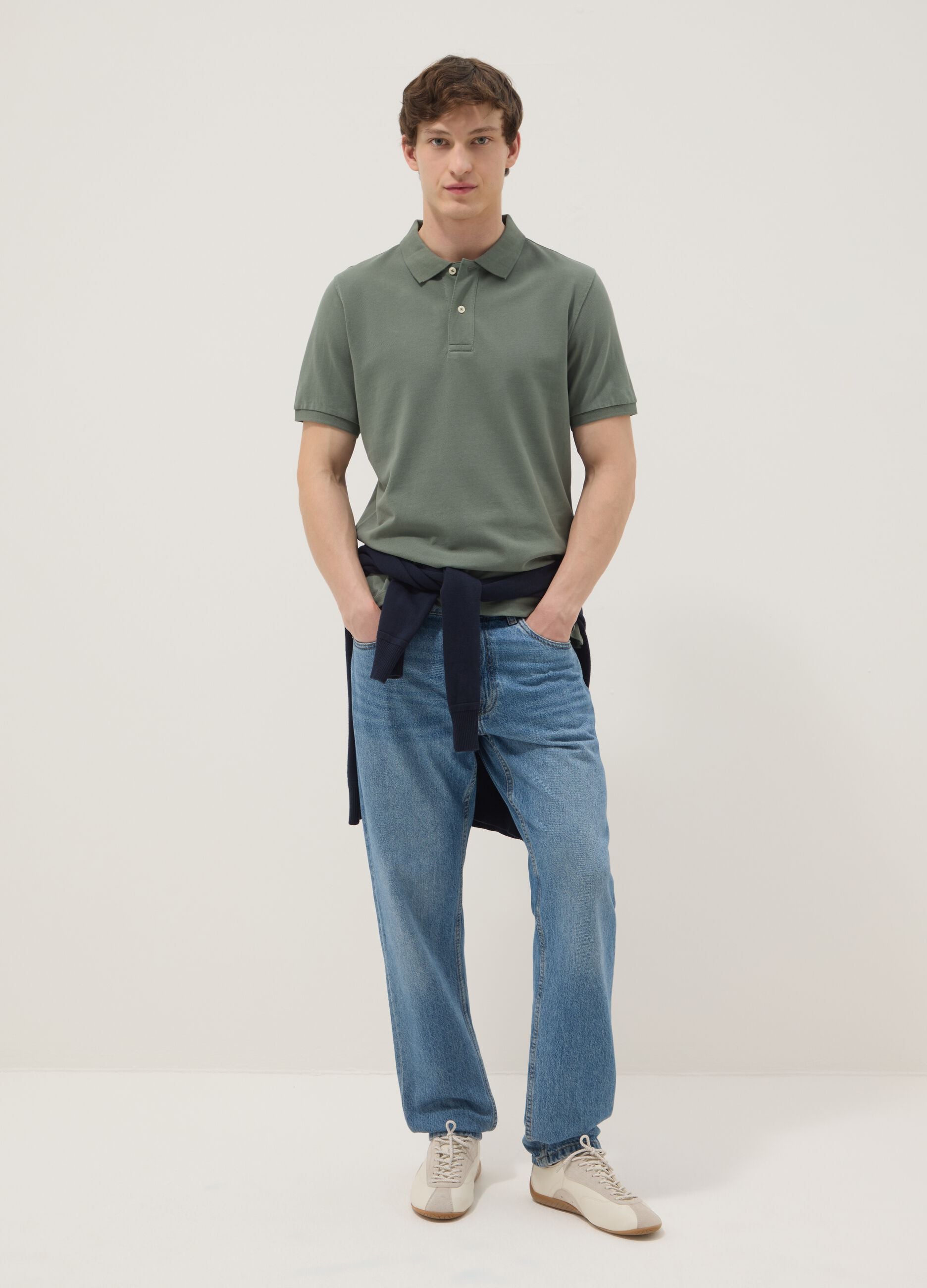 Green short-sleeved polo shirt in pure organic cotton