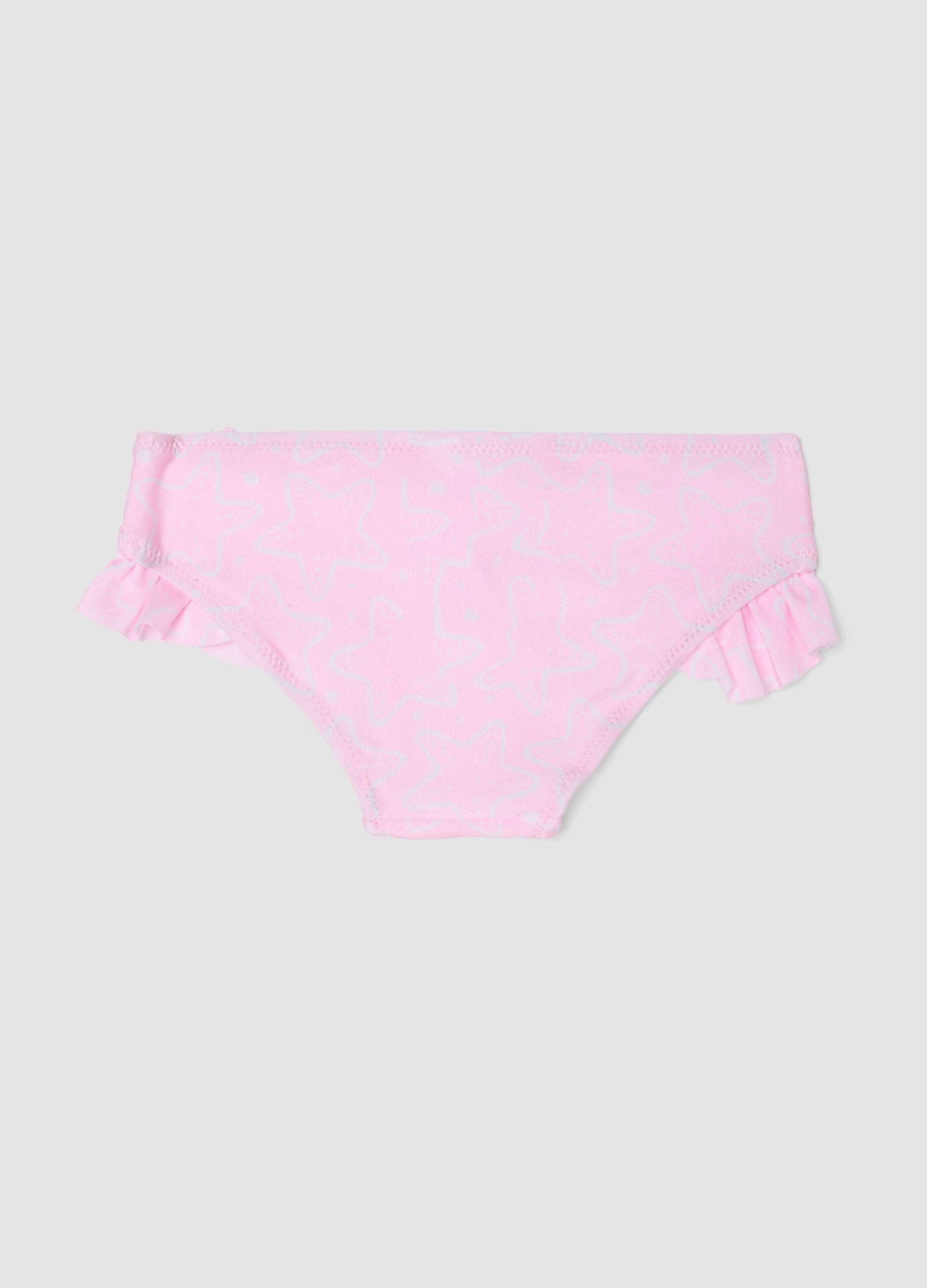 Pink baby swim briefs in stretch fabric with ruffles