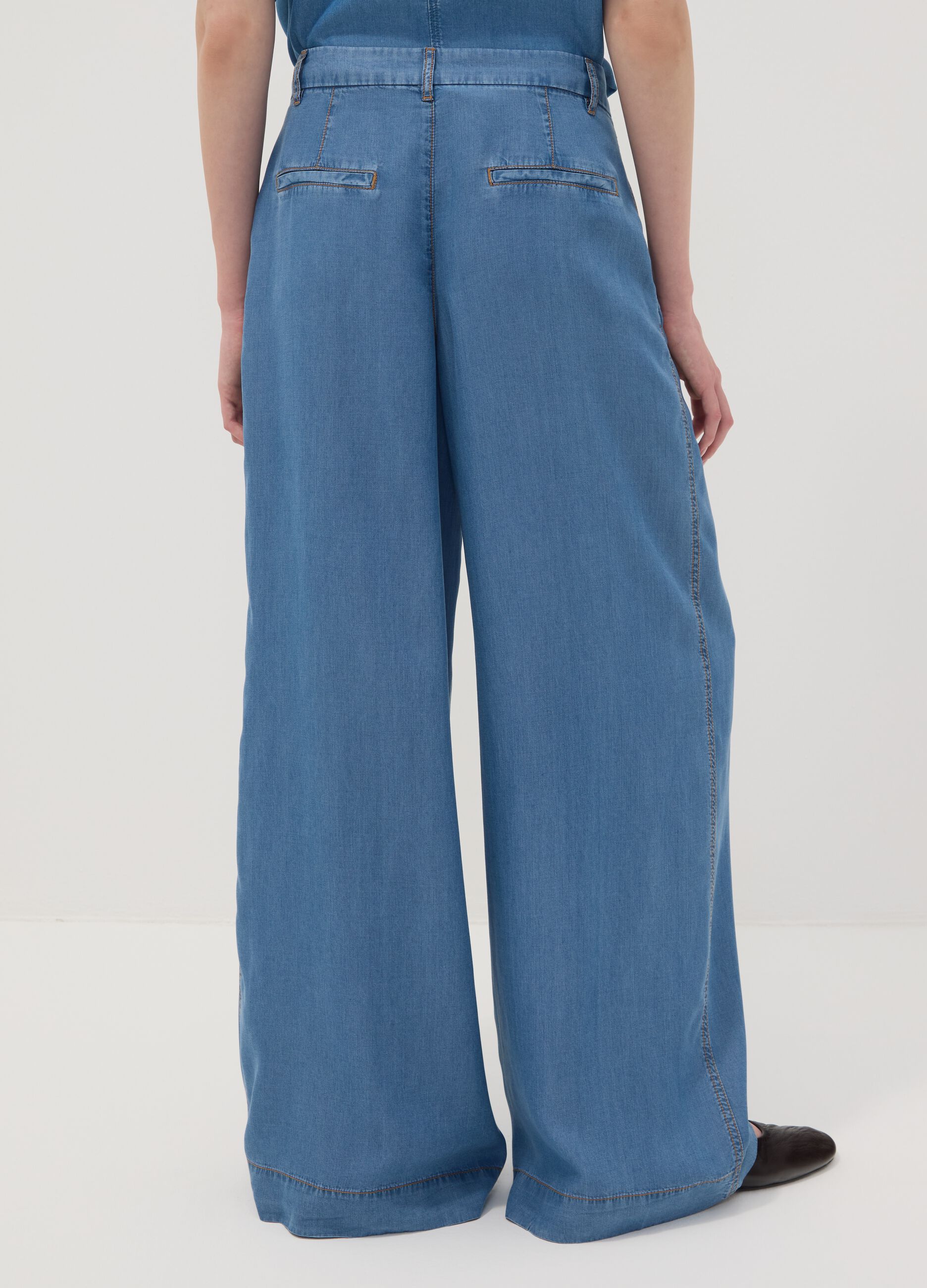Light blue wide-leg denim trousers in pure lyocell