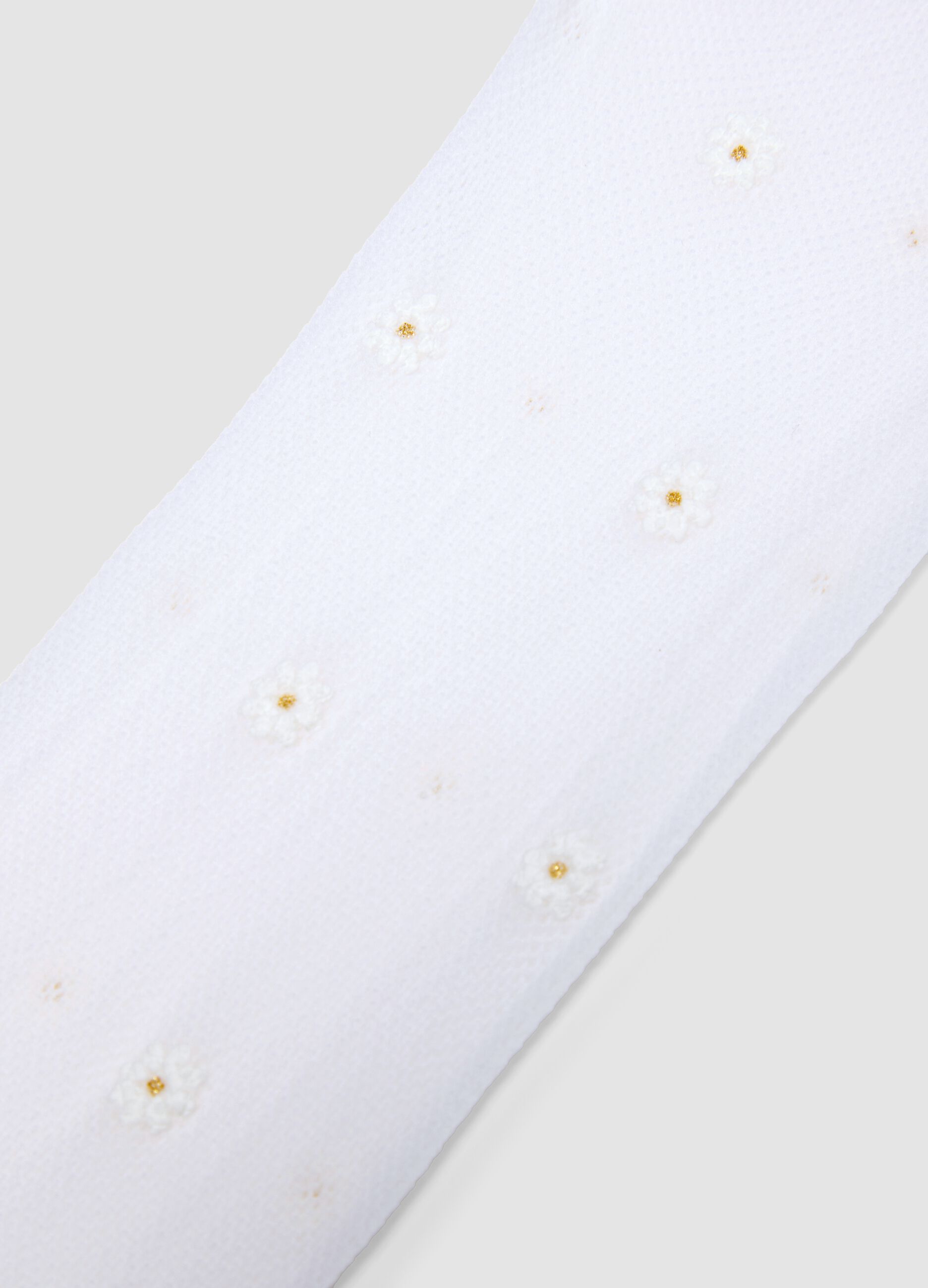 Comfortable white stretchy girl's tights with daisies