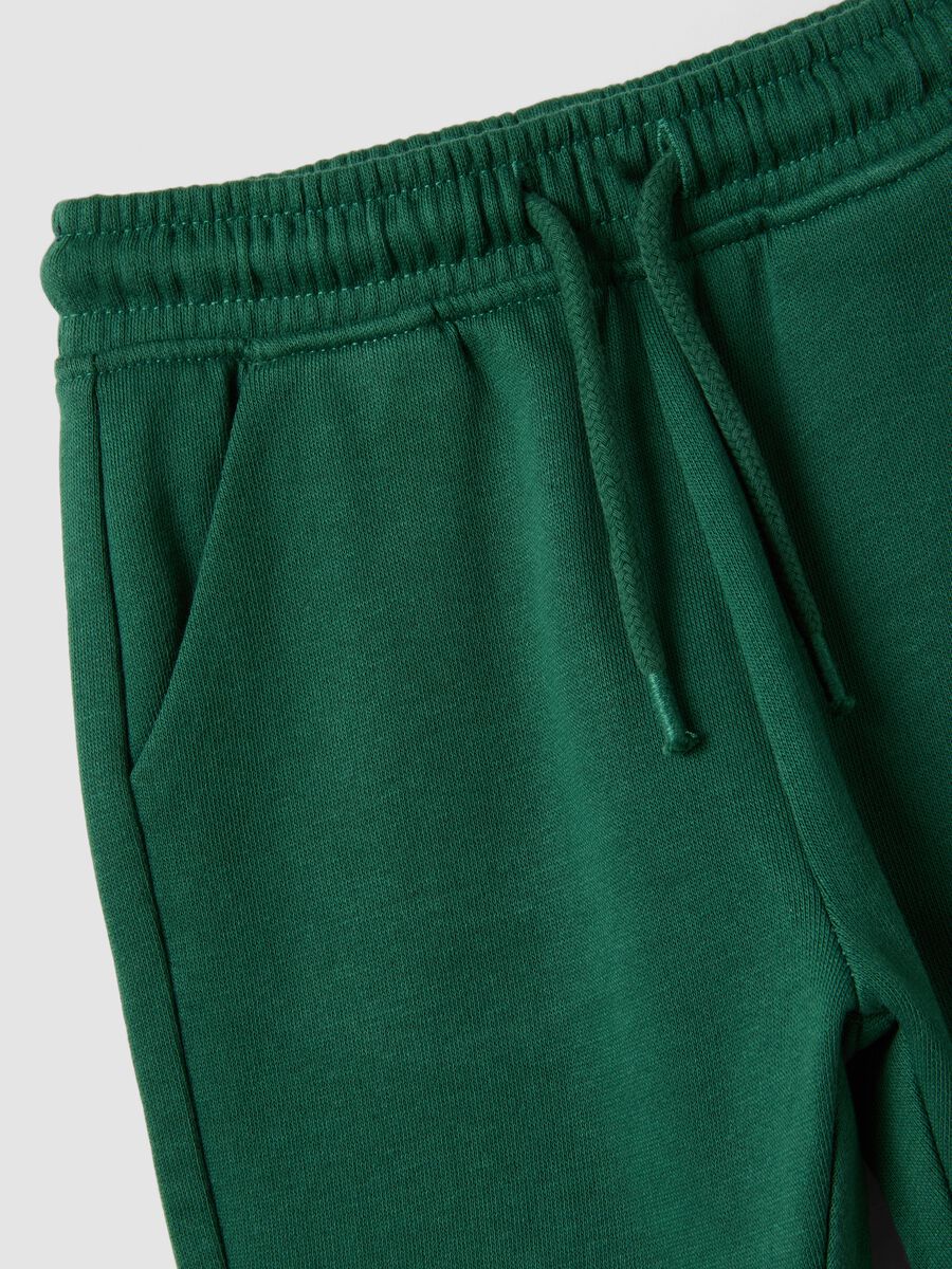 Green organic cotton joggers with drawstring for baby boy_2