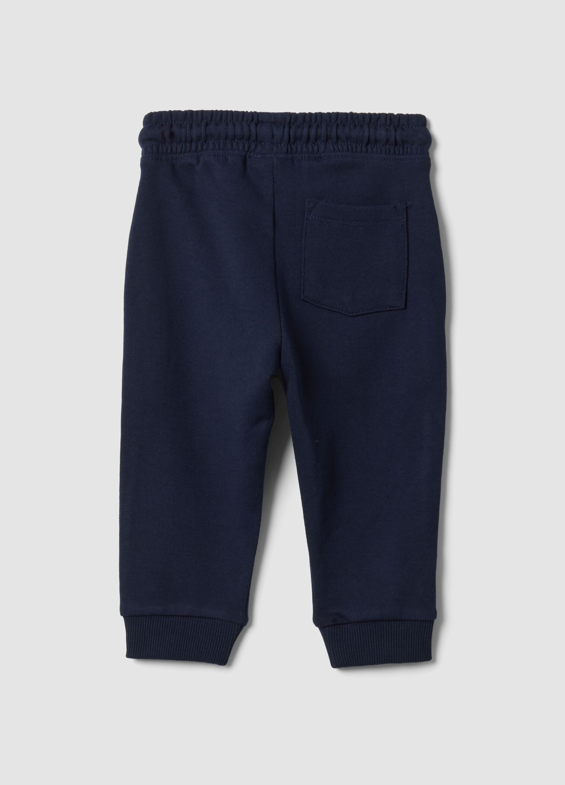 Blue pure cotton jogger trousers with puppy print for baby boy
