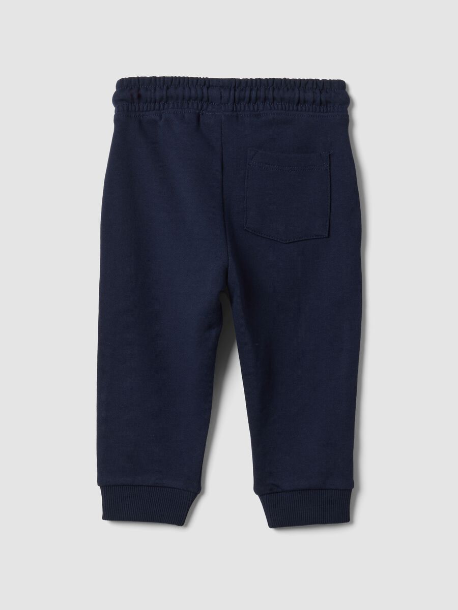 Blue pure cotton jogger trousers with puppy print for baby boy_1