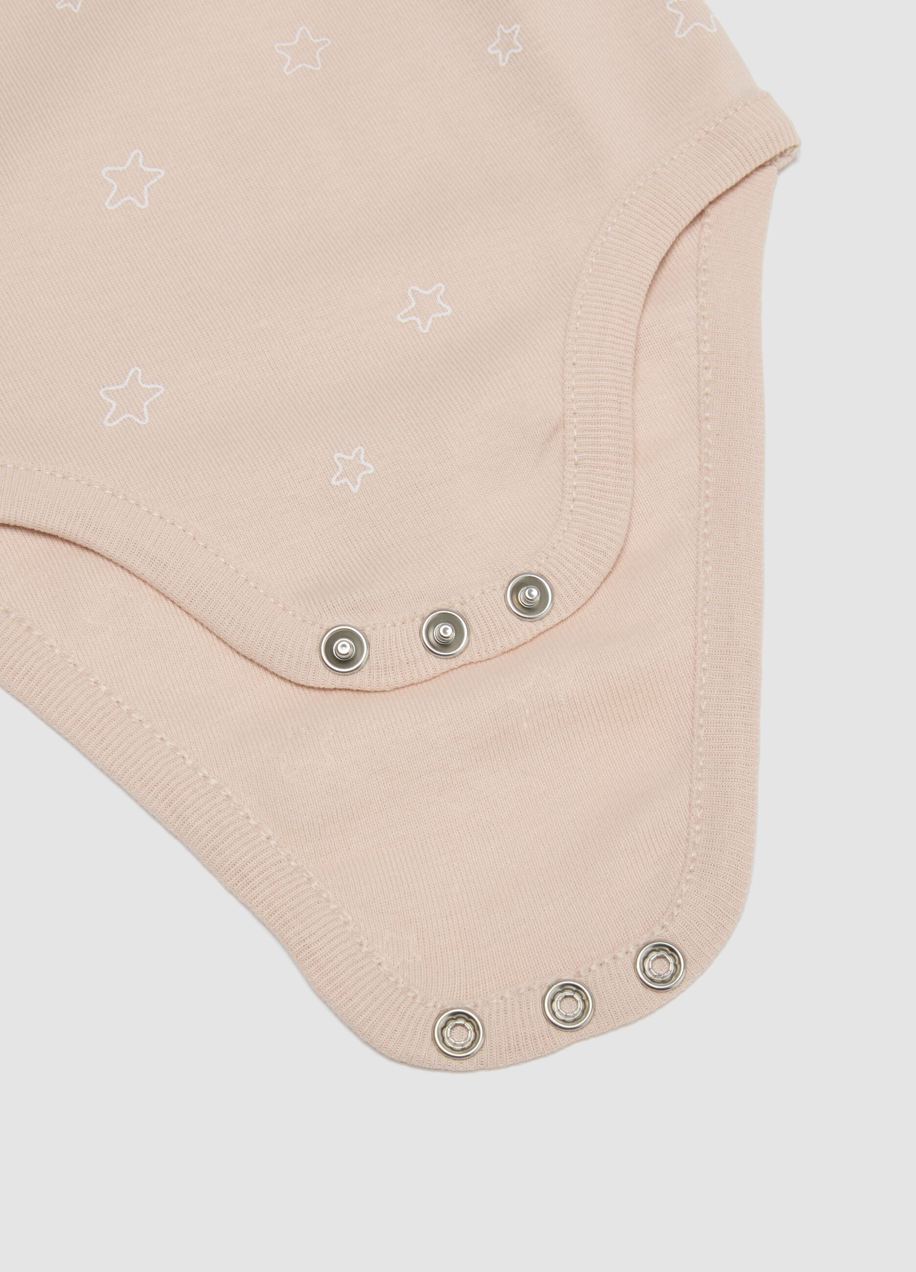 2-pack of white and beige short-sleeve organic cotton baby bodysuits