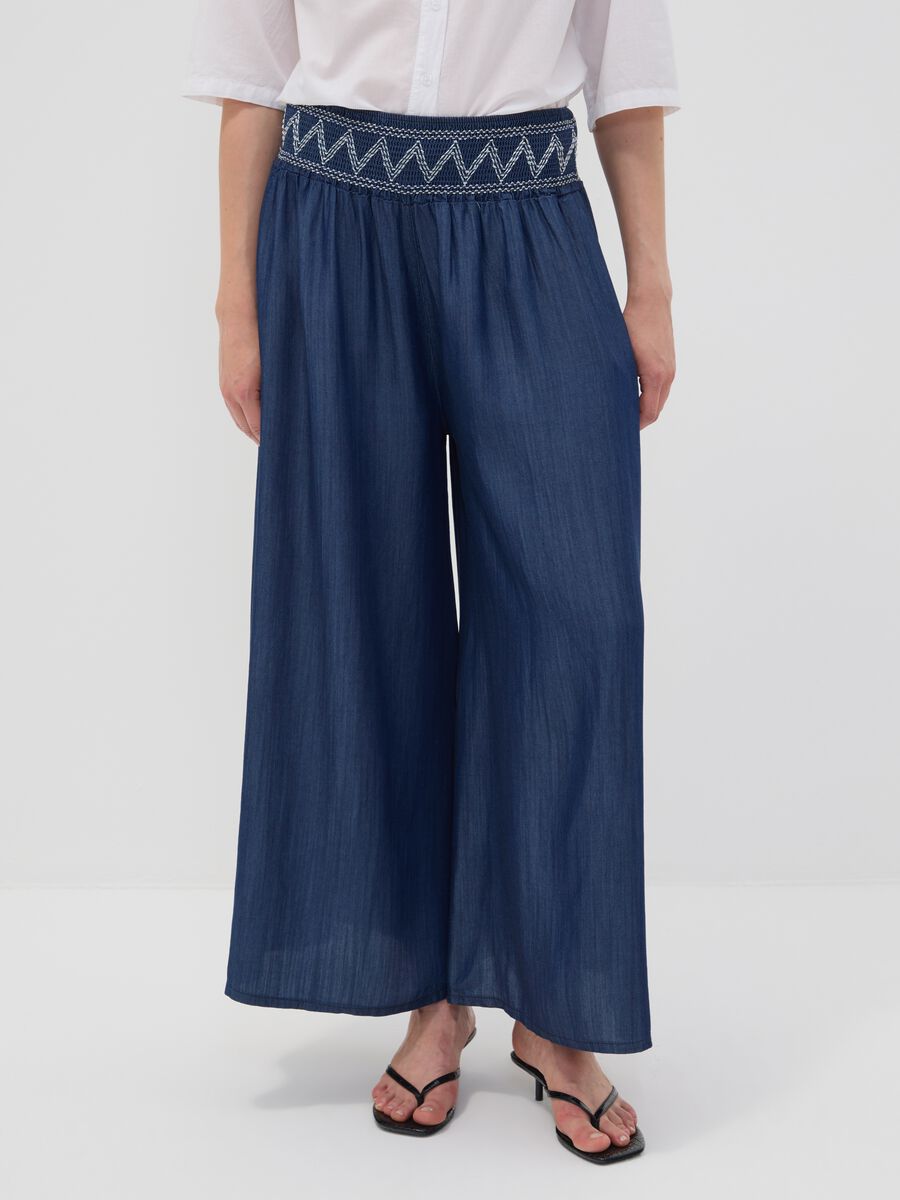 Wide-leg blue formal trousers in pure lyocell with embroidered waistband_1
