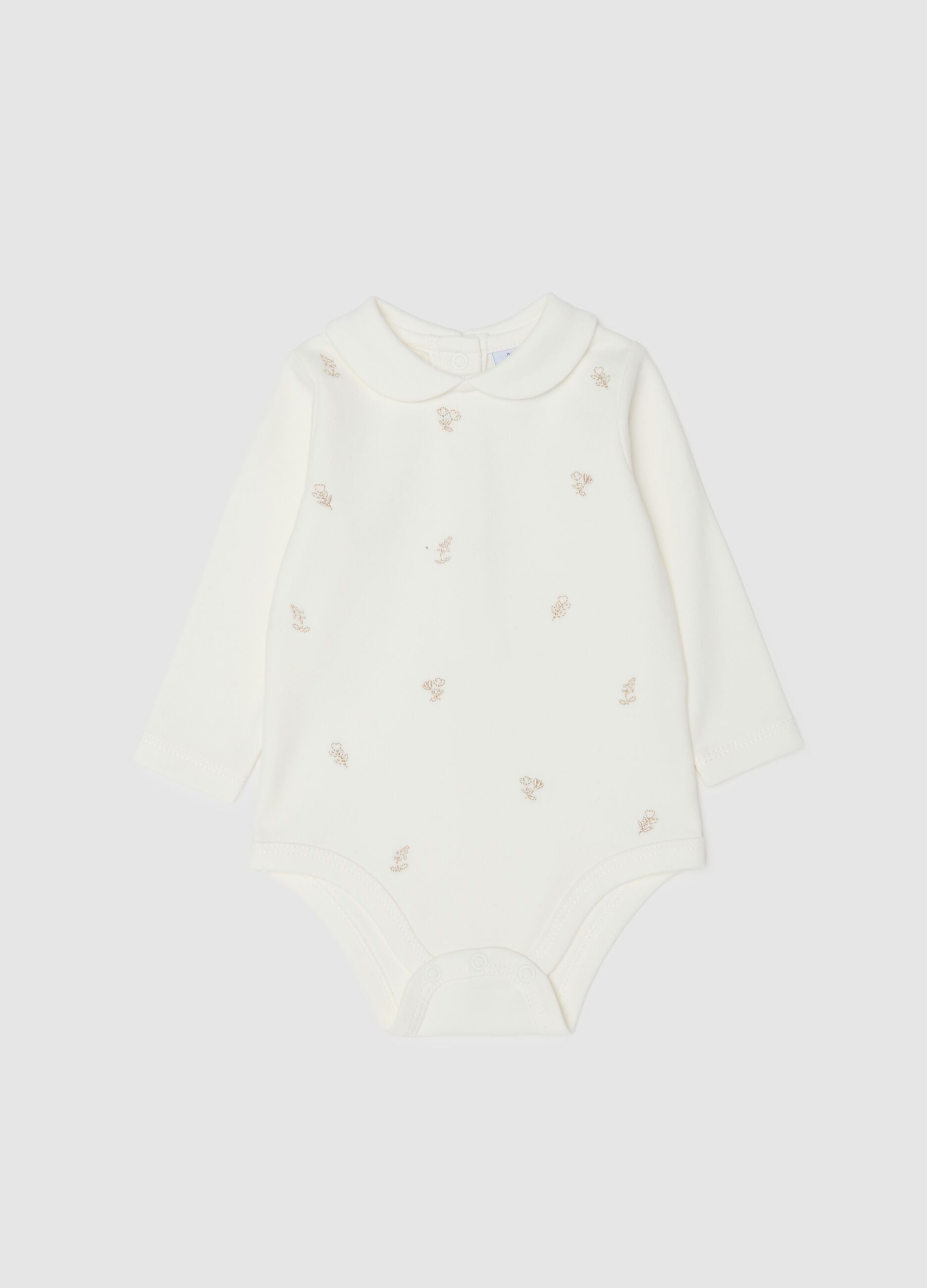 White baby girl's bodysuit in pure cotton with collar and embroidery