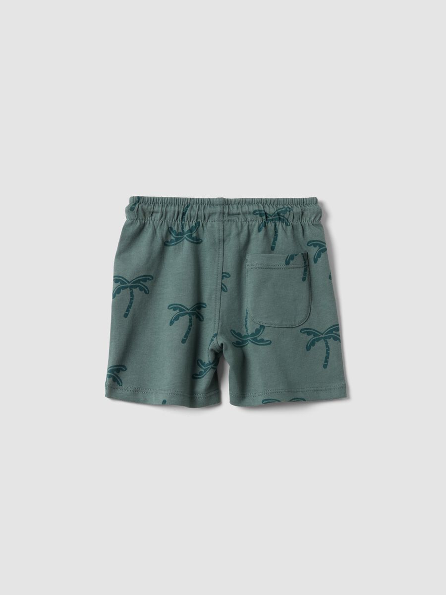 Short verde in cotone organico con stampa palme_1