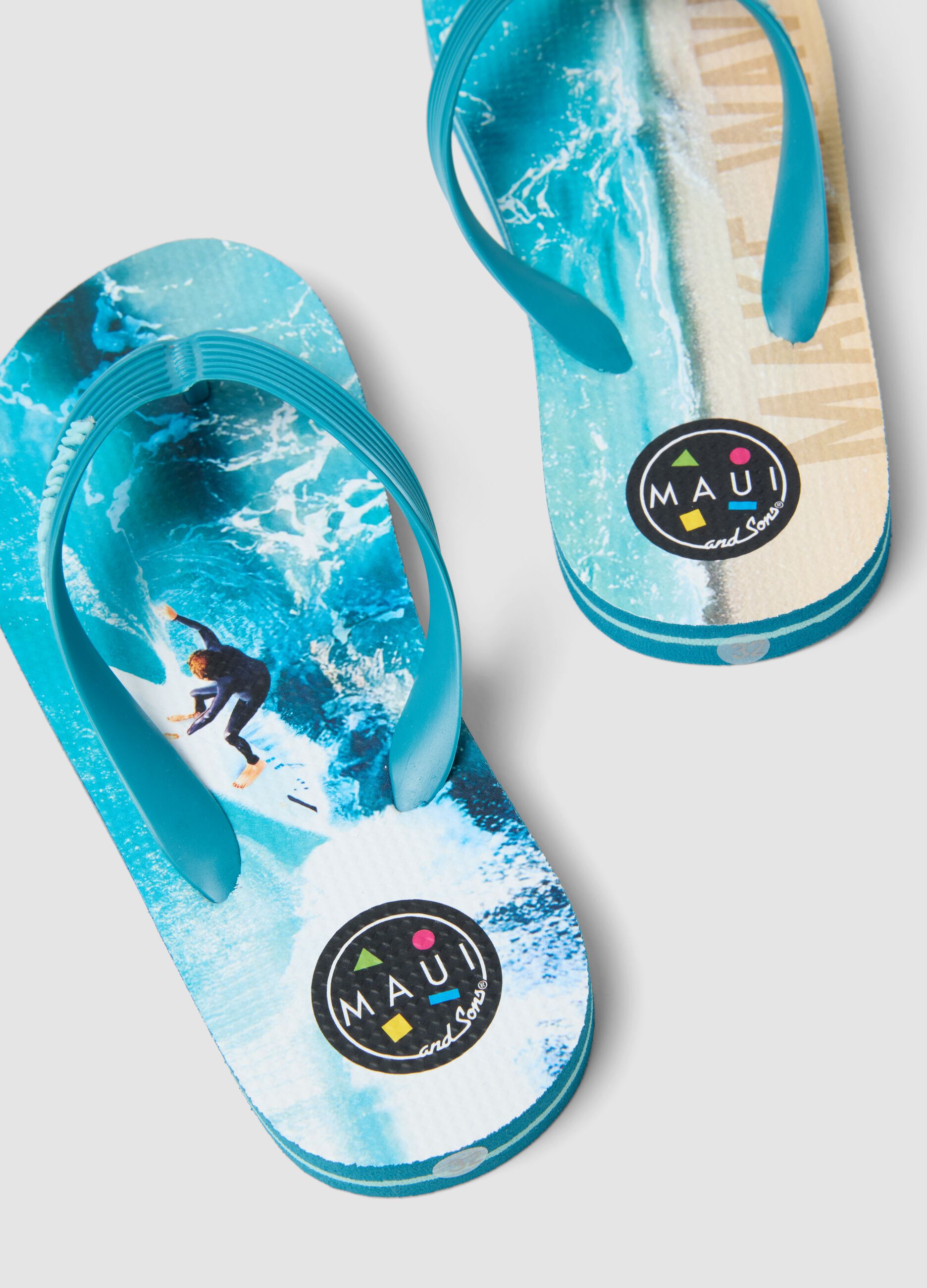 Blue and beige children's flip flops with surf design