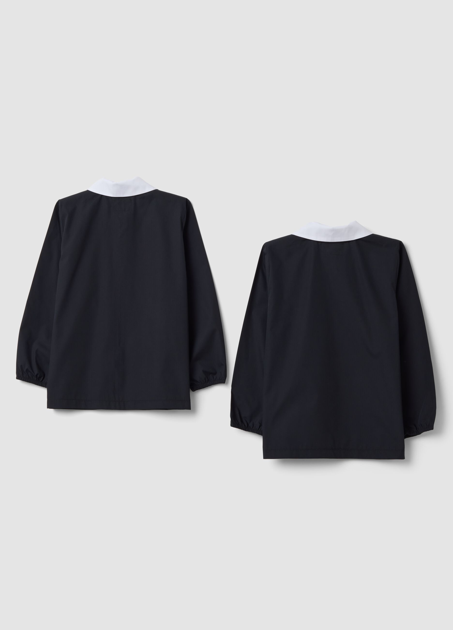 2-pack of black school smocks with zip and white collar