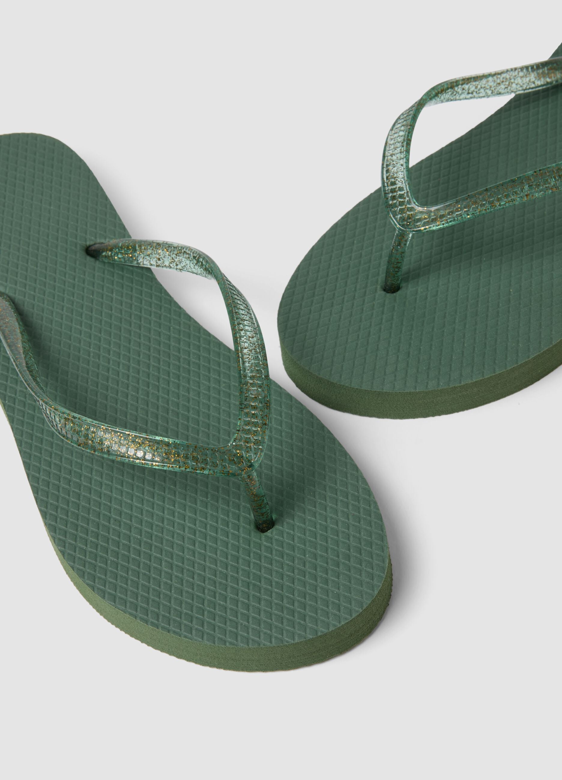 Green flip-flops with translucent straps