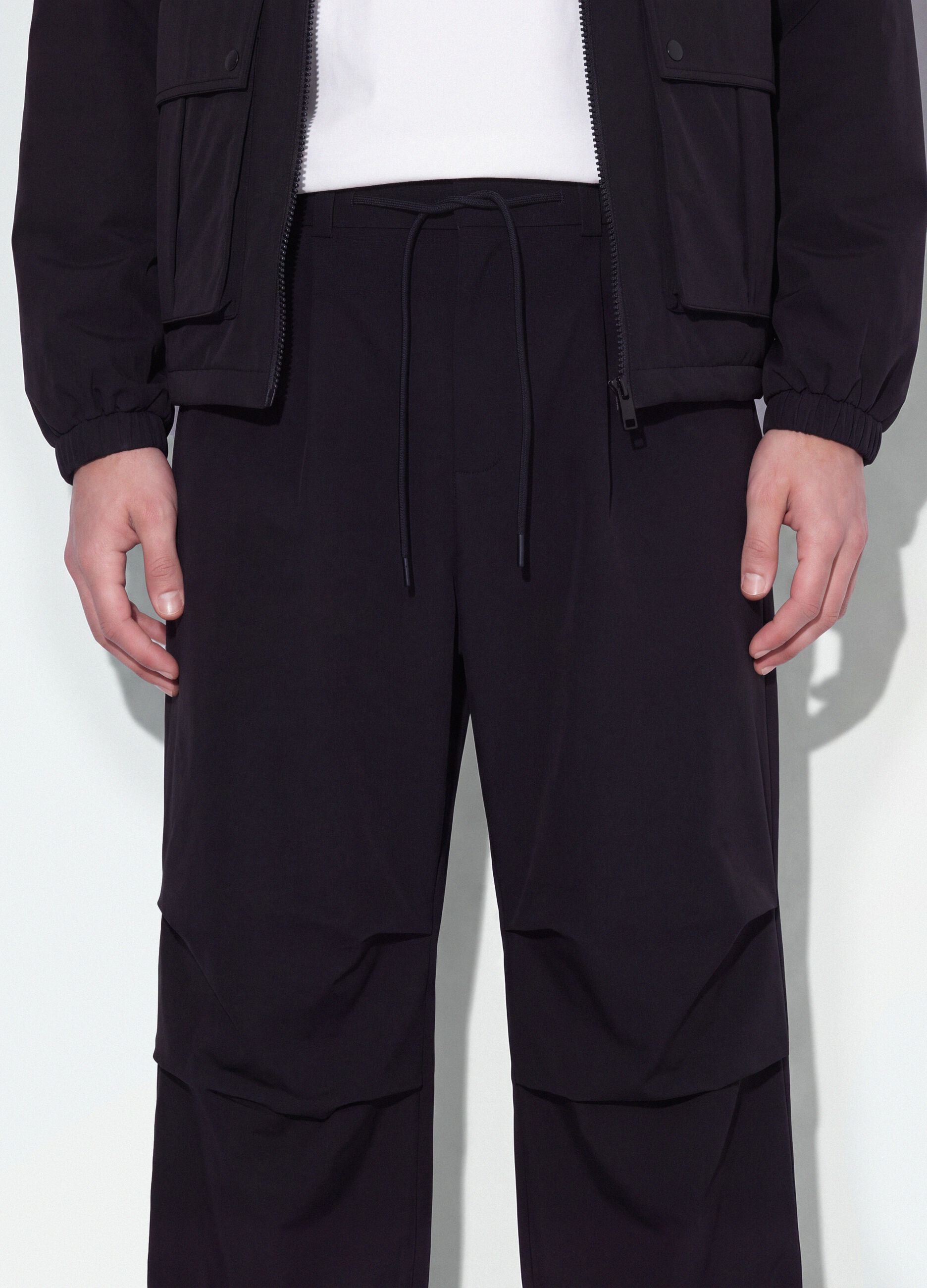 Black stretch-fabric parachute-fit trousers