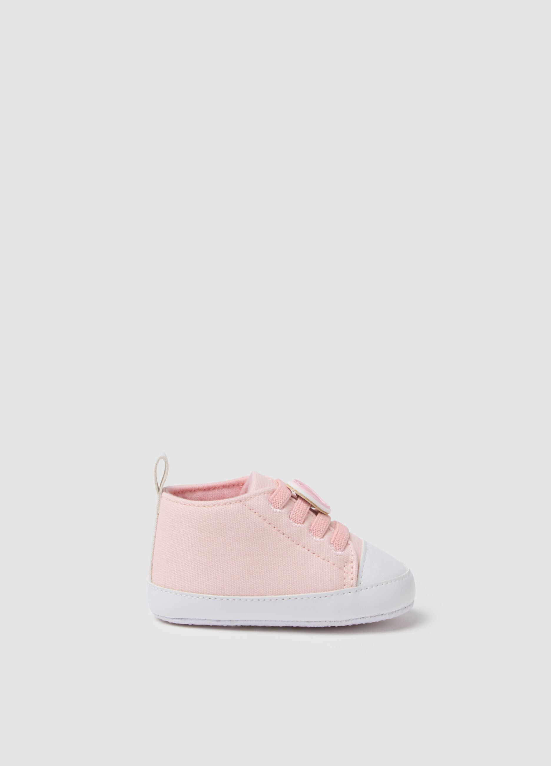 Pink canvas booties for newborn girl
