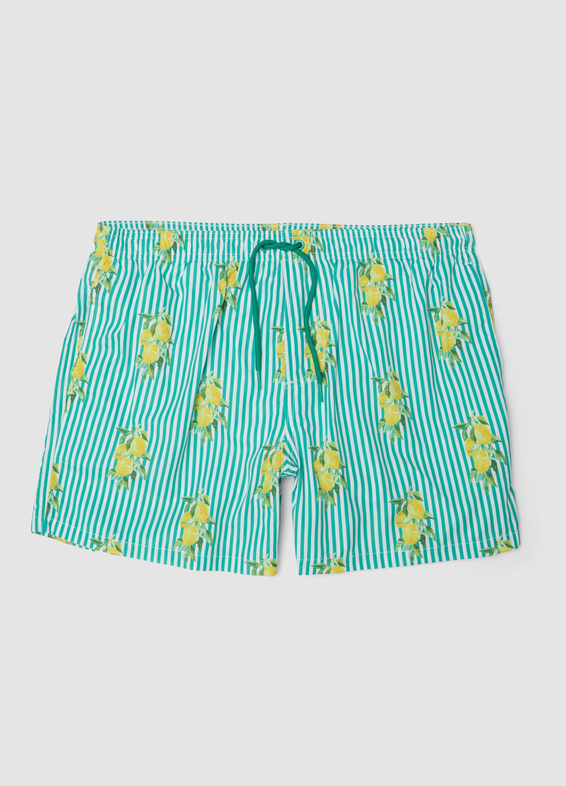 Blue striped swim shorts with lemon print