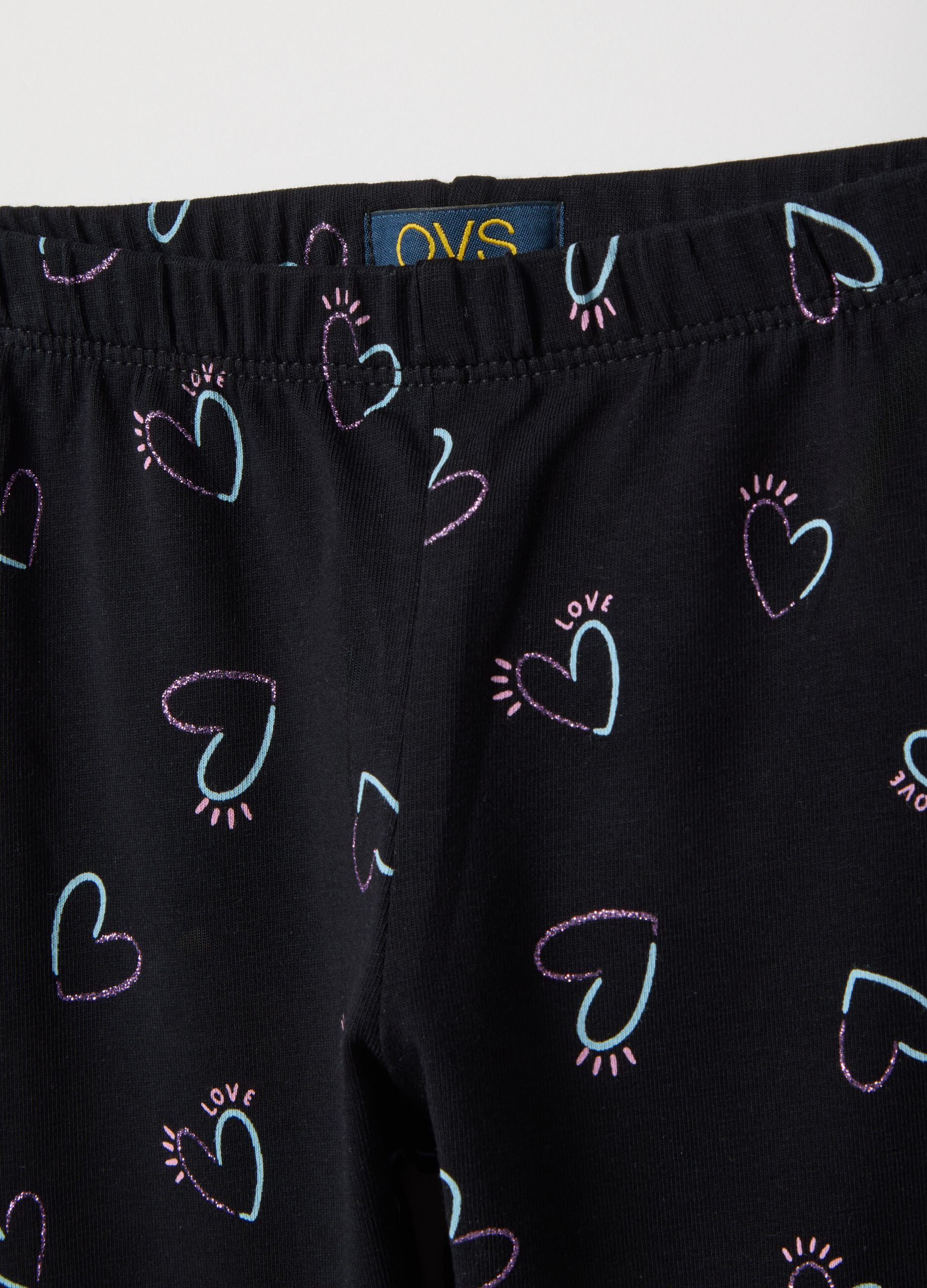 Girls' black stretch cotton skinny fit leggings with hearts