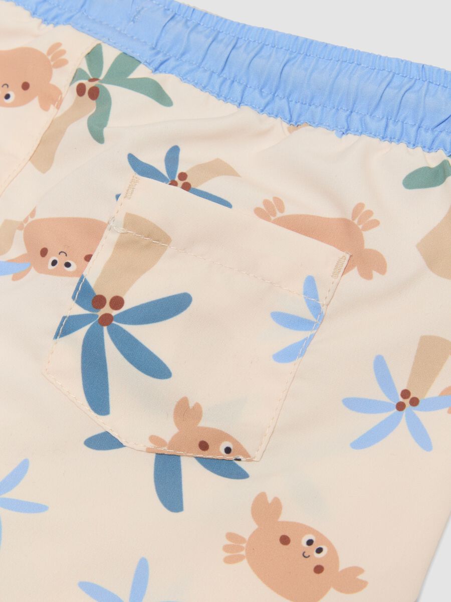 Costume shorts beige da mare con stampa tropicale per bimbo_3