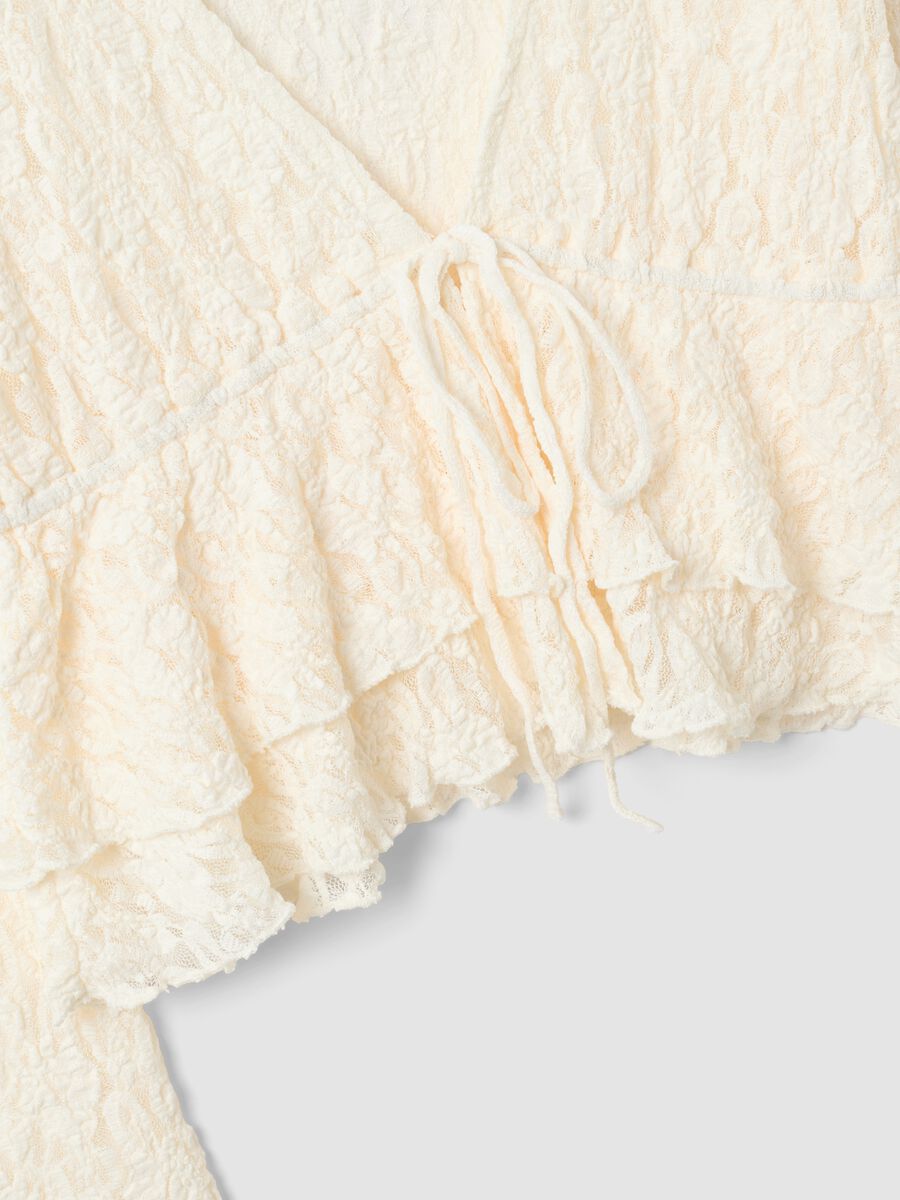 White stretch top with deep V-neck and ruffle trim_5