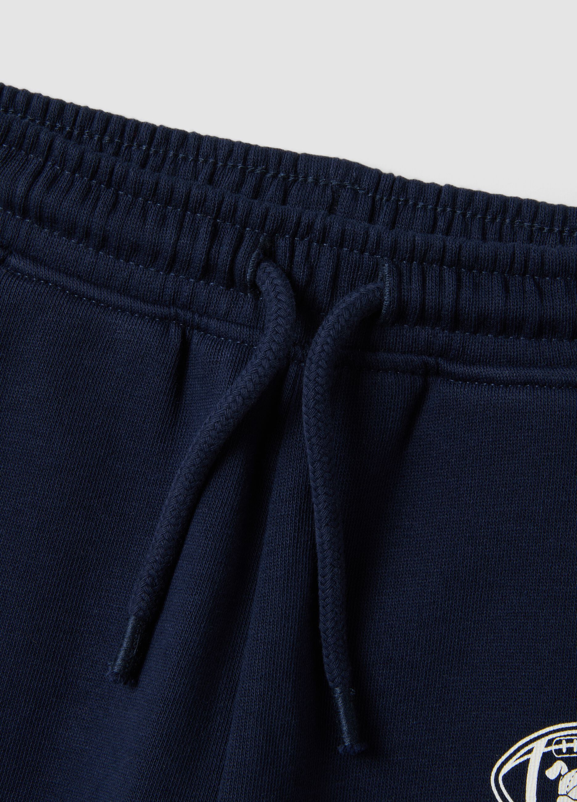 Blue jogger trousers in pure organic cotton with drawstring for baby boy