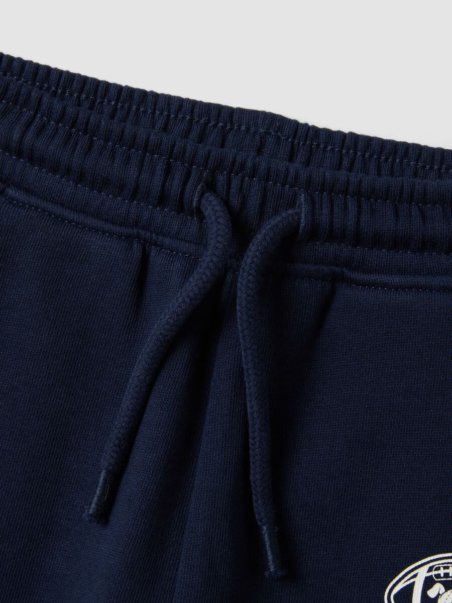 Blue jogger trousers in pure organic cotton with drawstring for baby boy_2