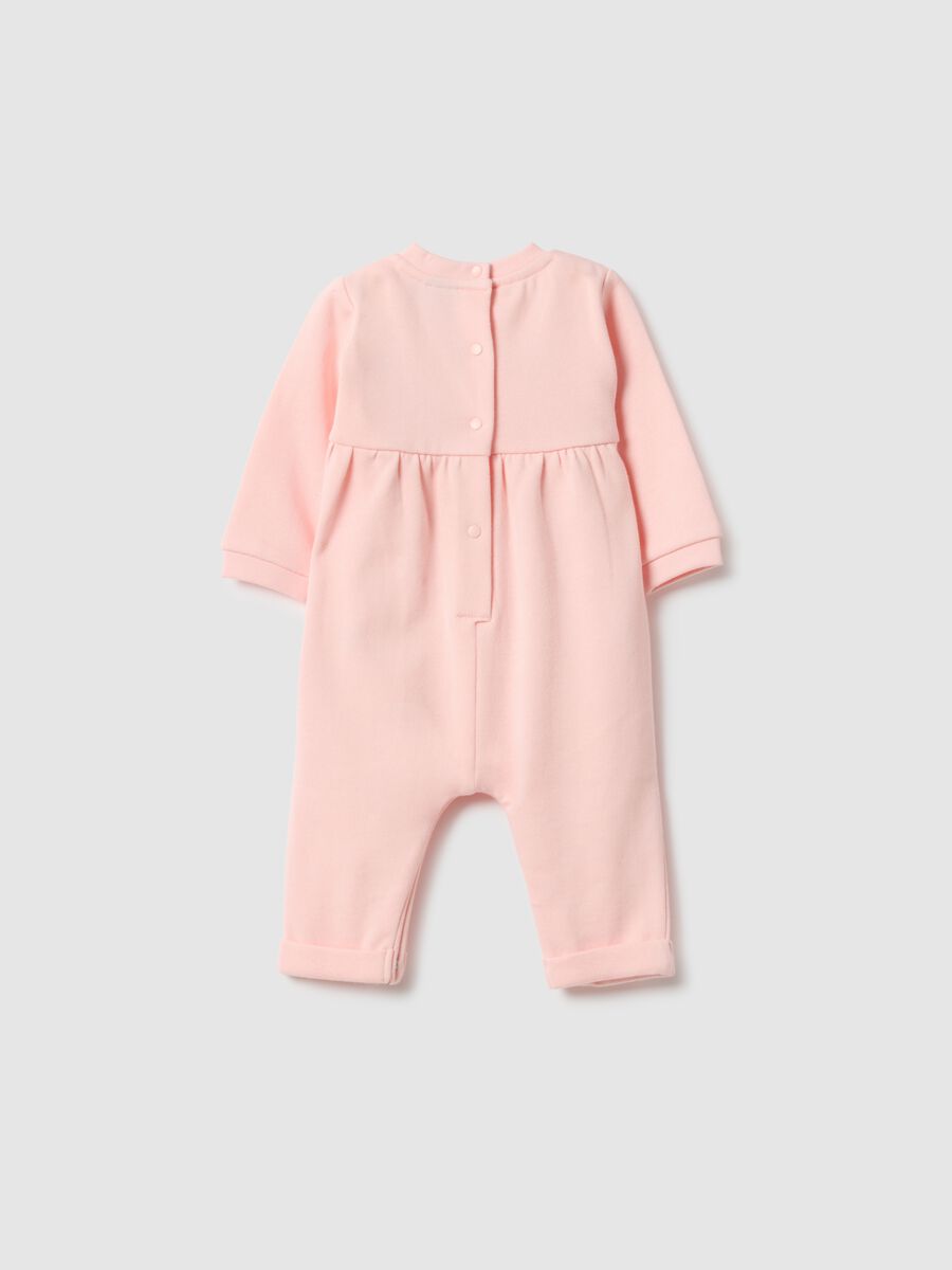 Tutina rosa da neonata in puro cotone con dettagli ricamati_1