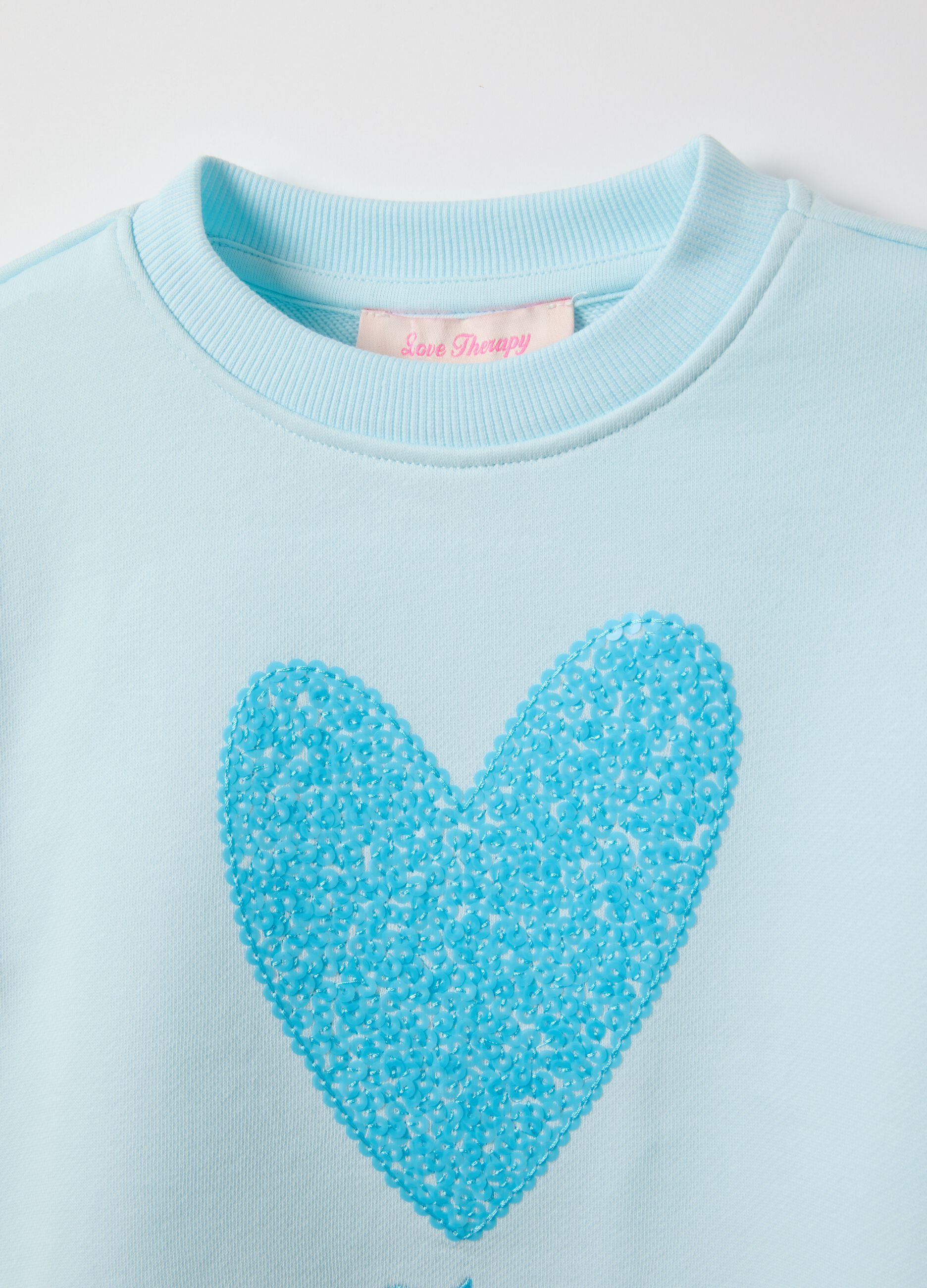 Sky blue cotton blend regular fit sweatshirt with heart for girls