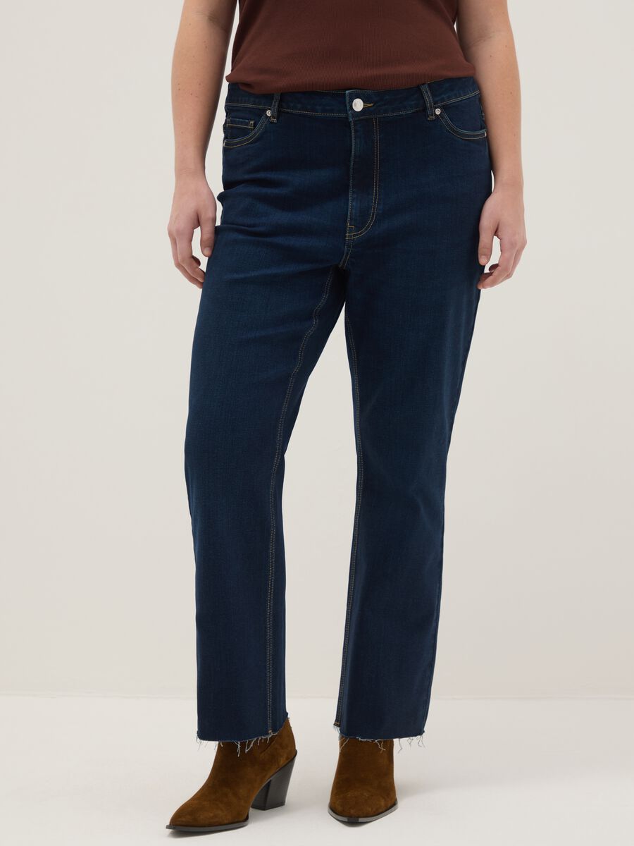 Jeans blu elasticizzati con taglio flare_1