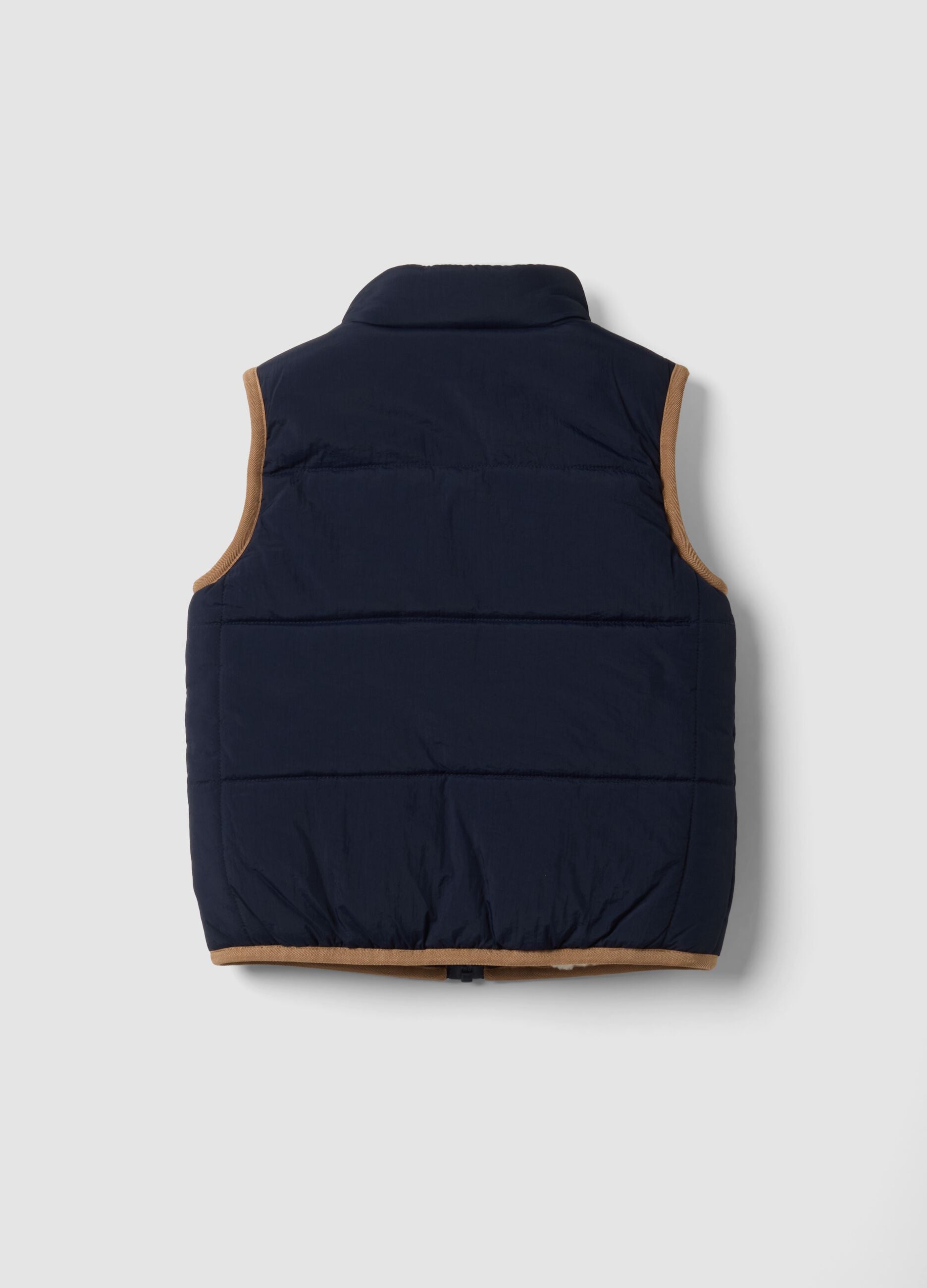 Blue padded gilet with zip and contrast trims