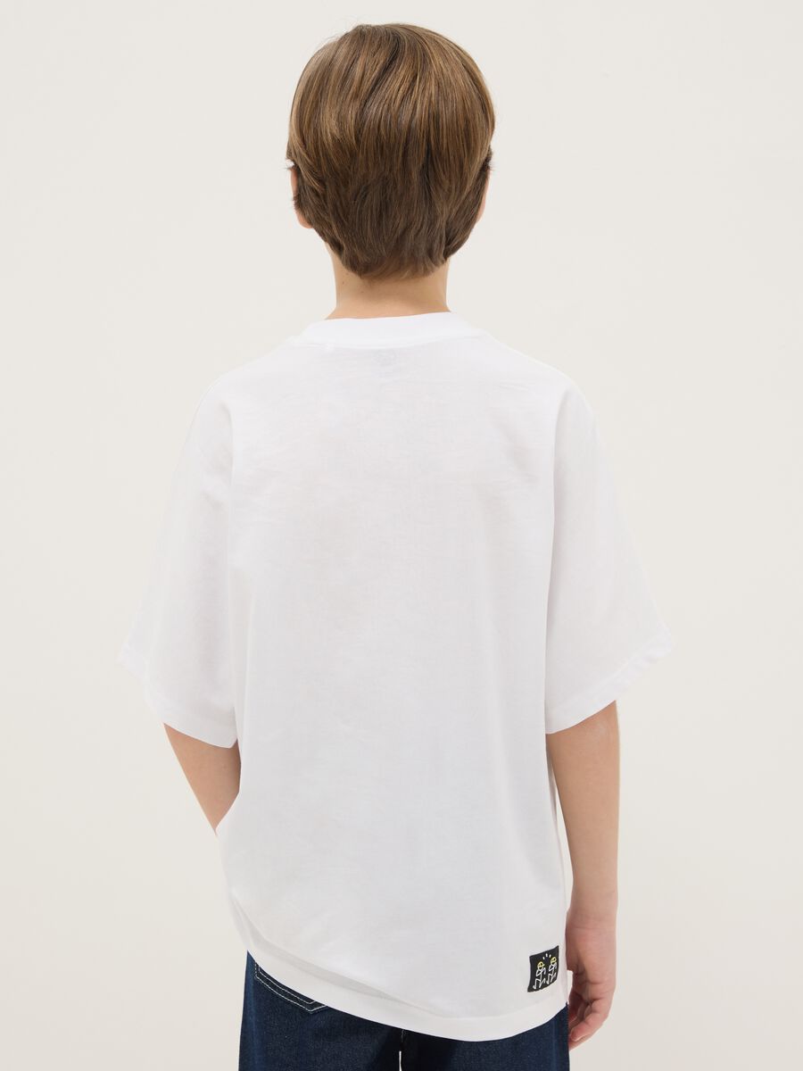 T-shirt in puro cotone bianco da ragazzo over fit con stampa_1