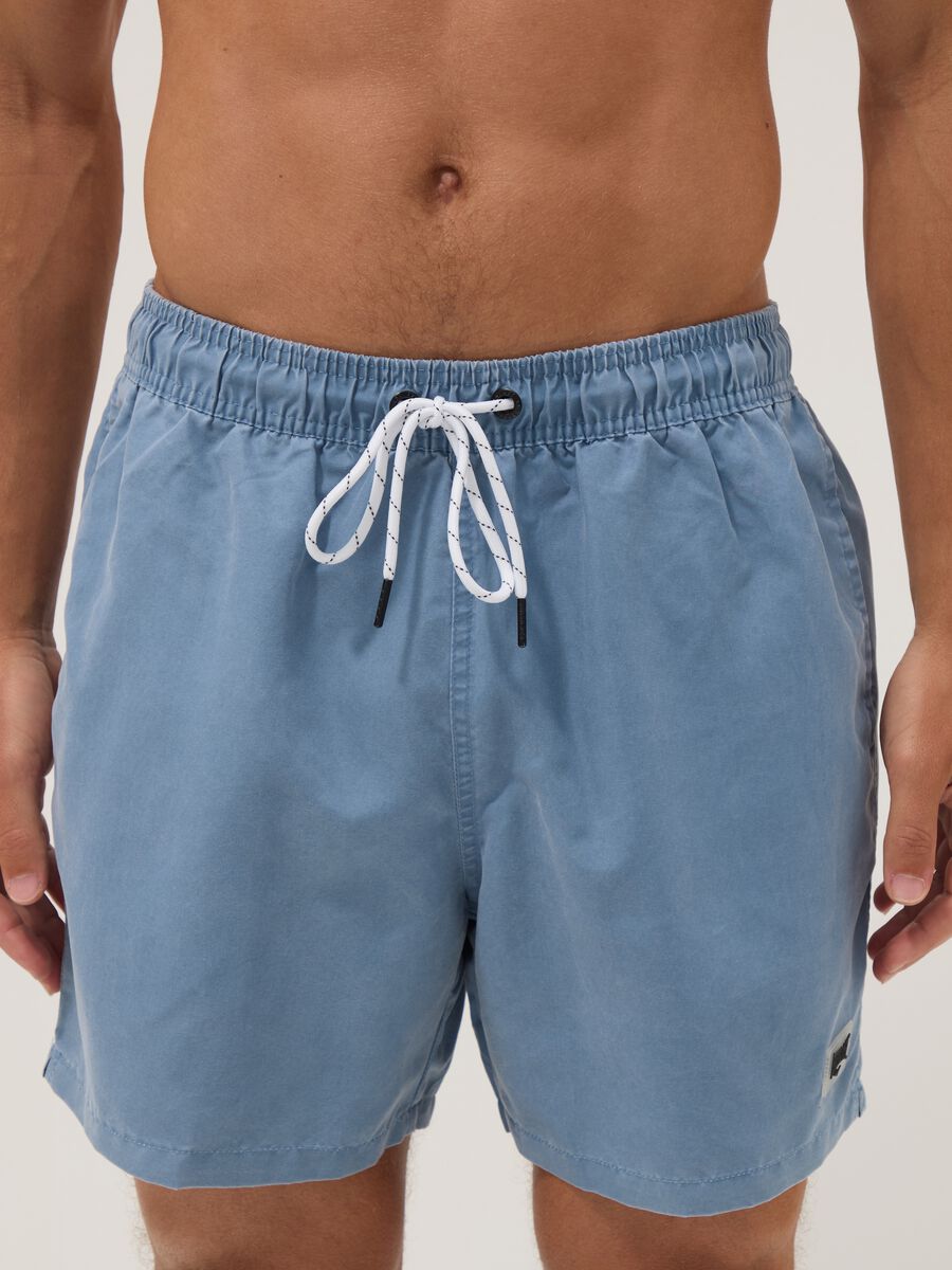 Blue swim shorts with drawstring waist_2