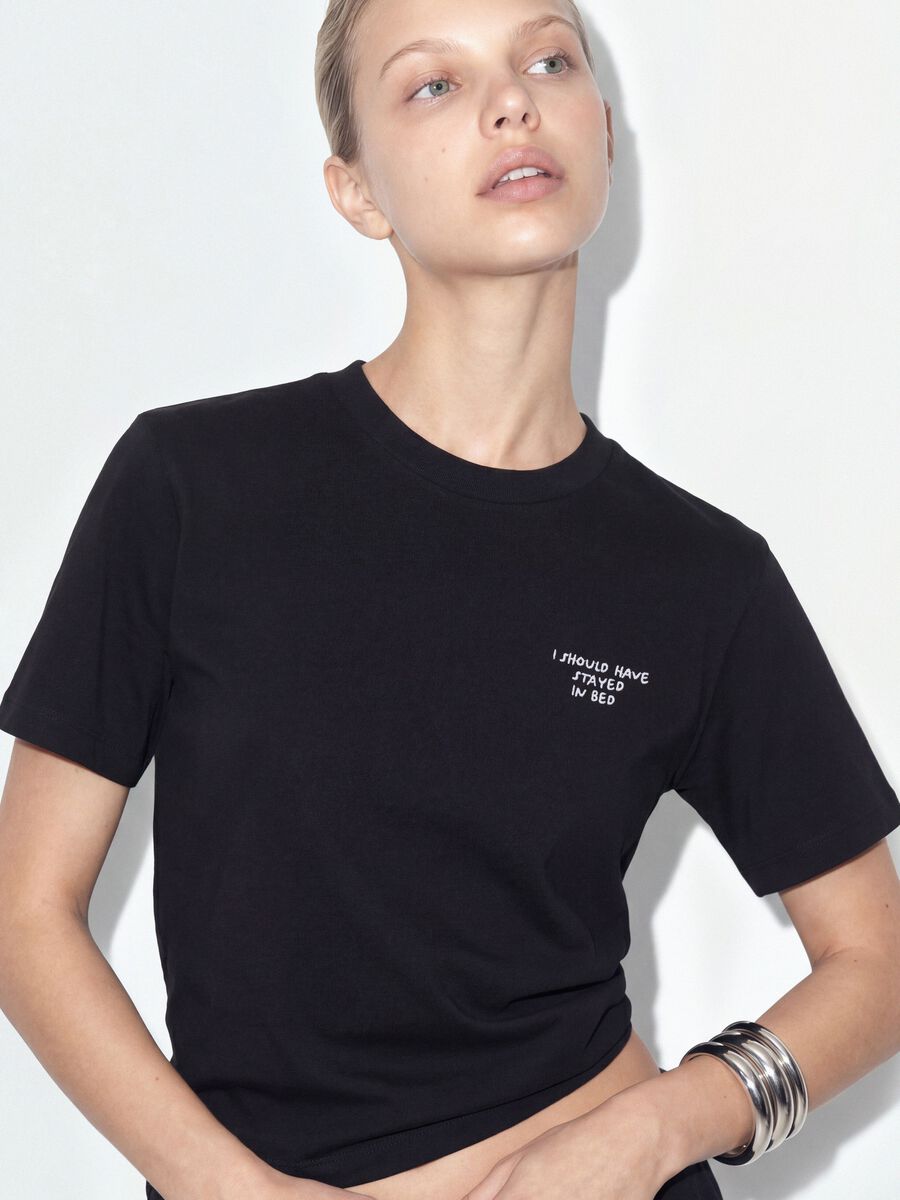Black relaxed-fit pure cotton T-shirt with embroidered slogan_0