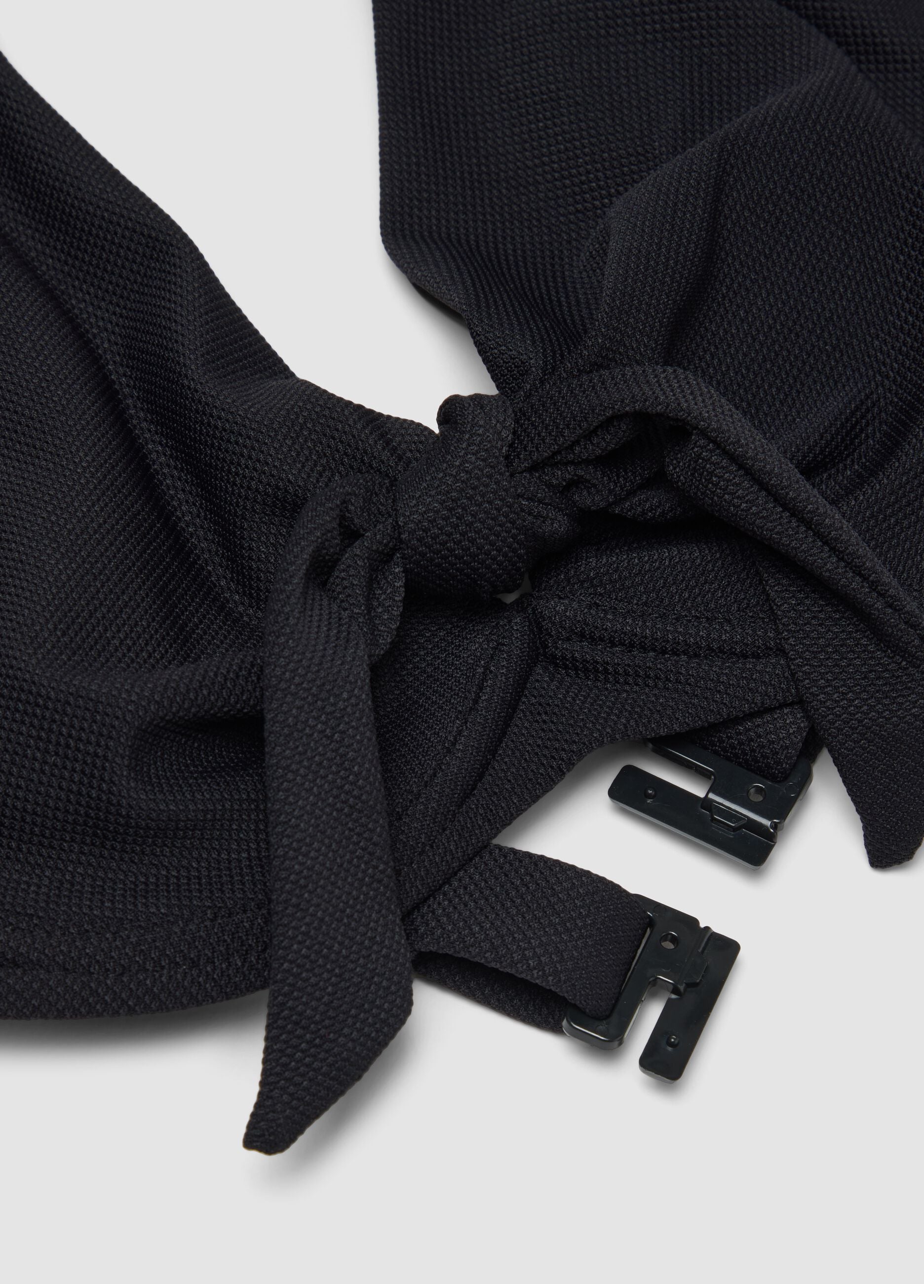 Black stretch bikini top with bow
