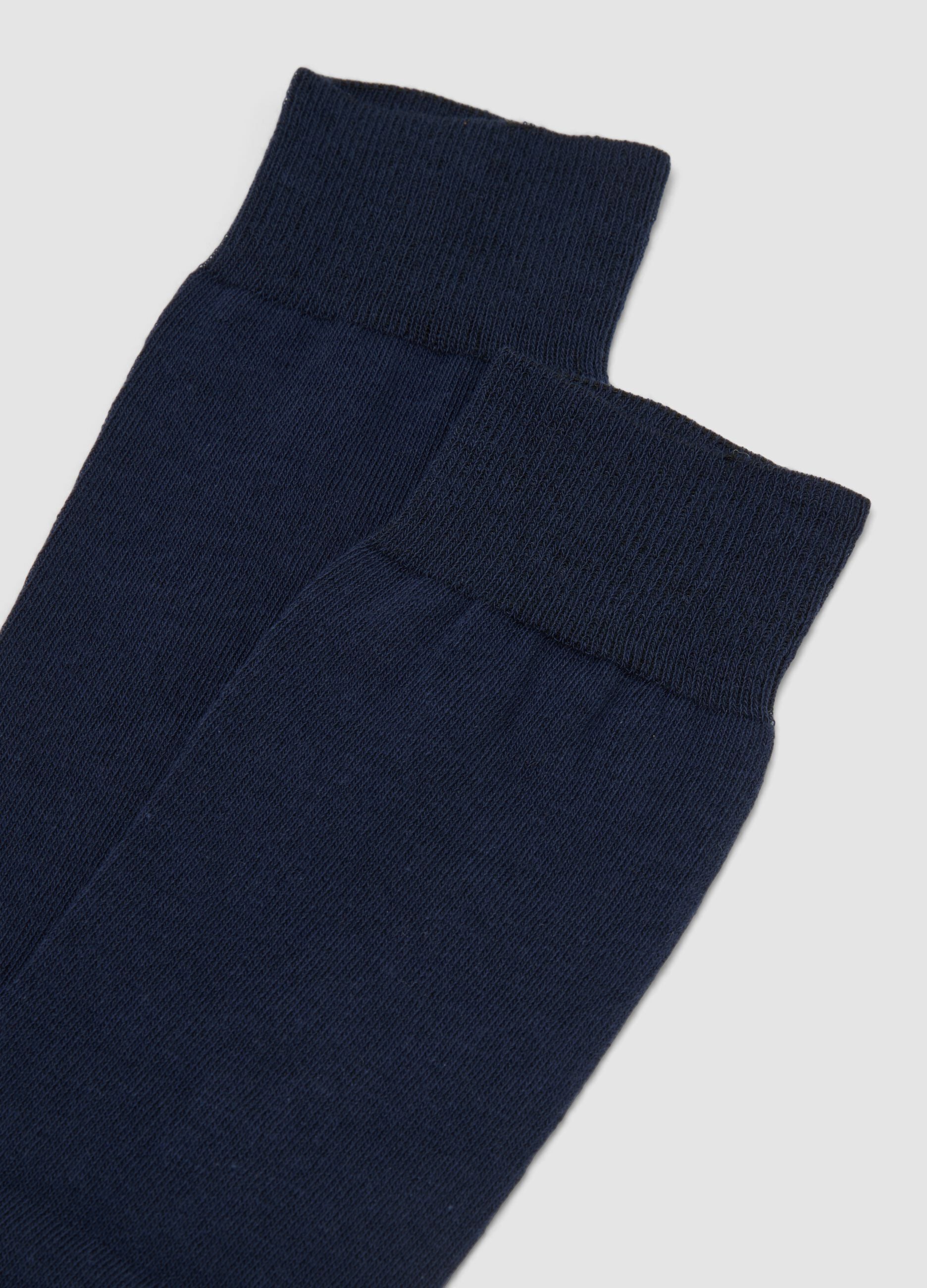 Two-pack of blue and green long socks in stretch cotton
