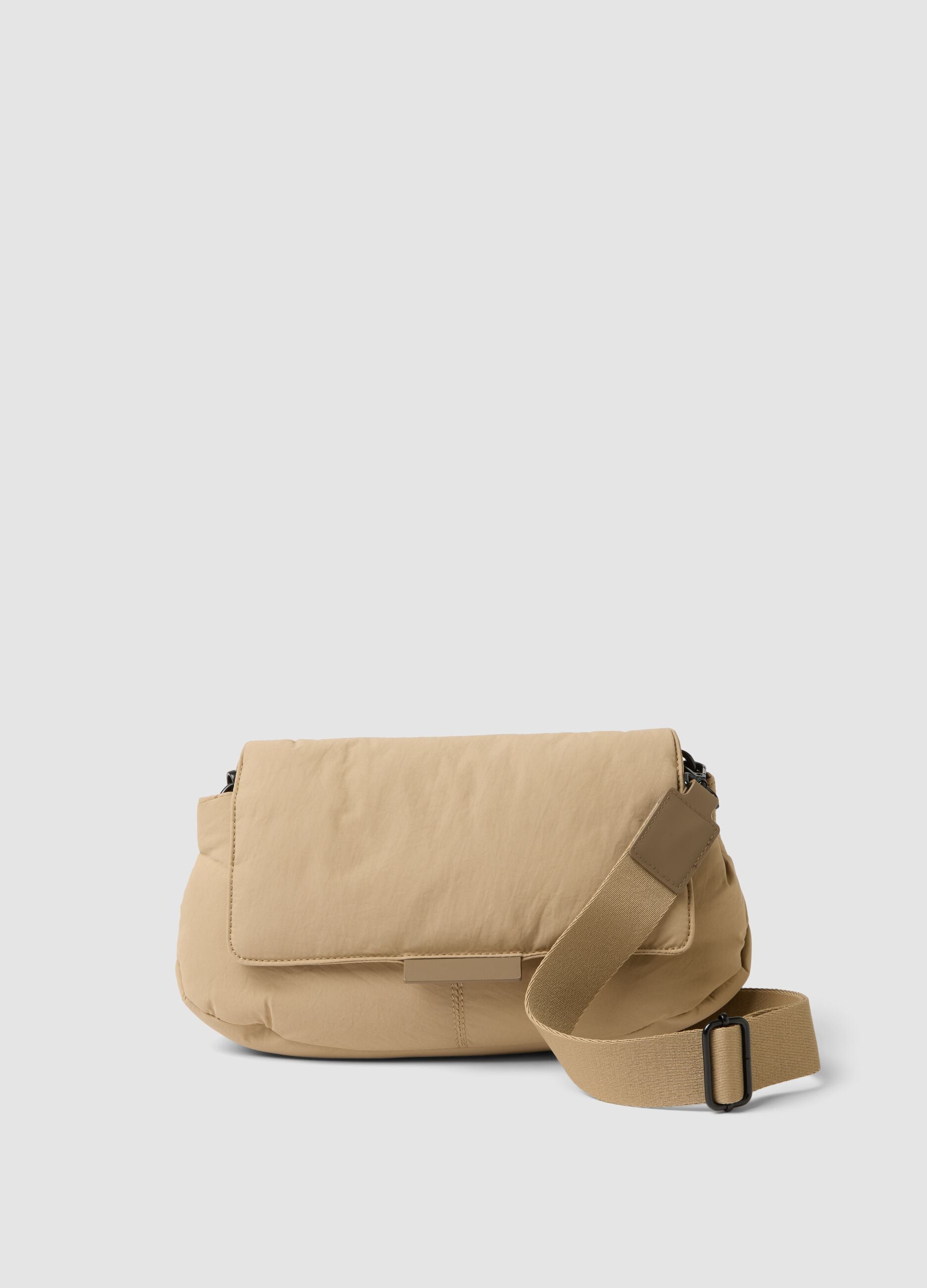 Beige crossbody bag with flap and adjustable strap