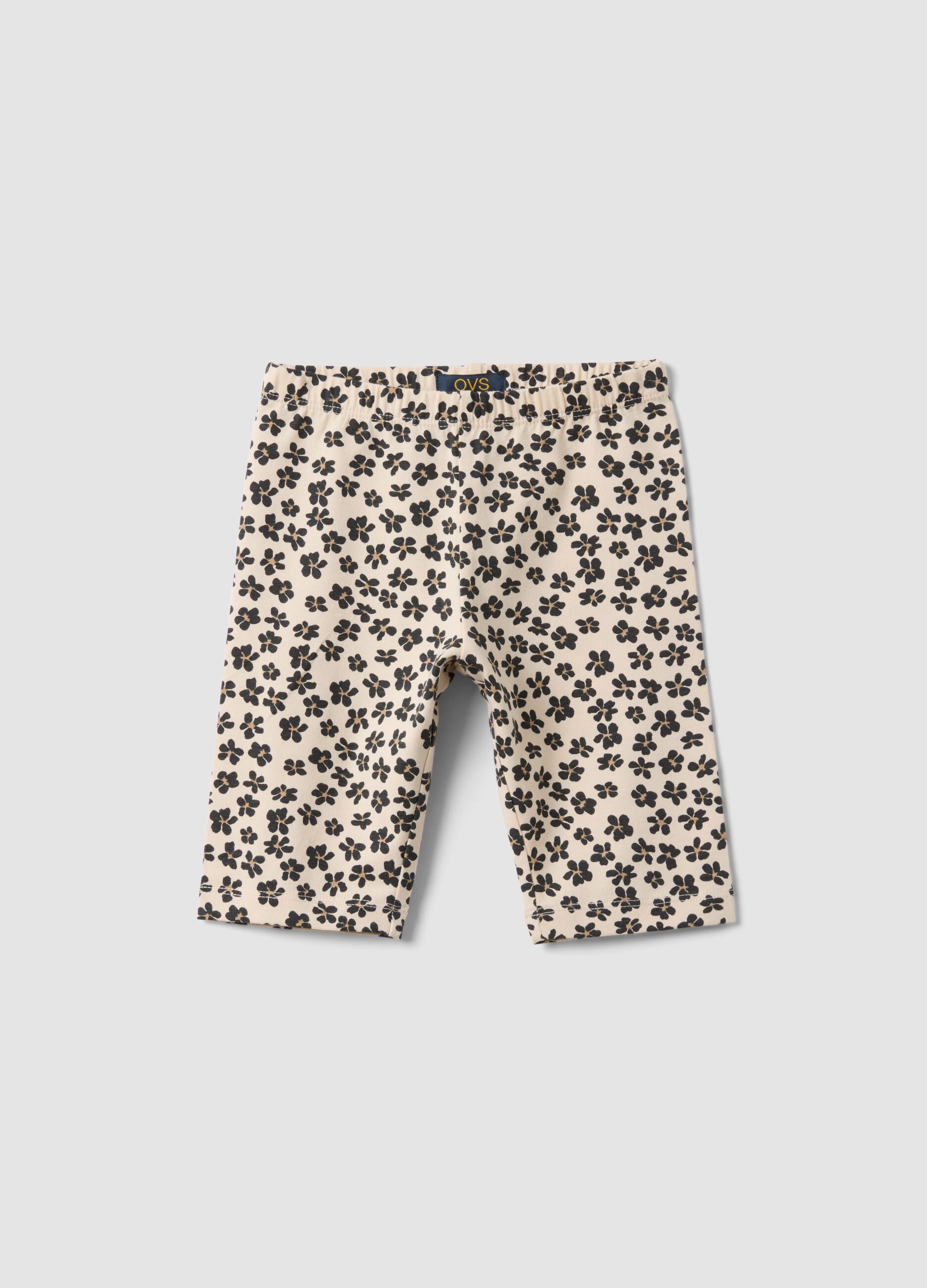 Beige organic cotton shorts with floral print
