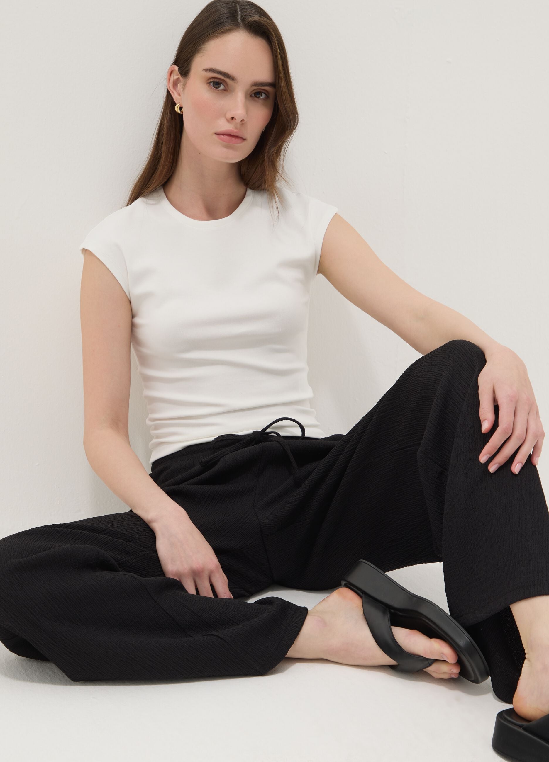 Black wide-leg jogger trousers