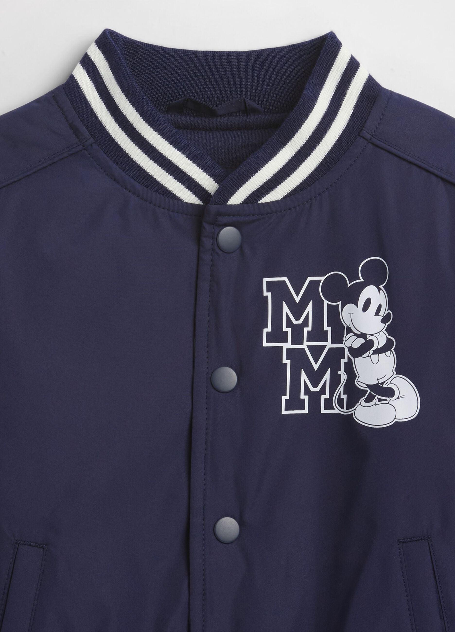 Children's blue bomber jacket with Disney-themed details