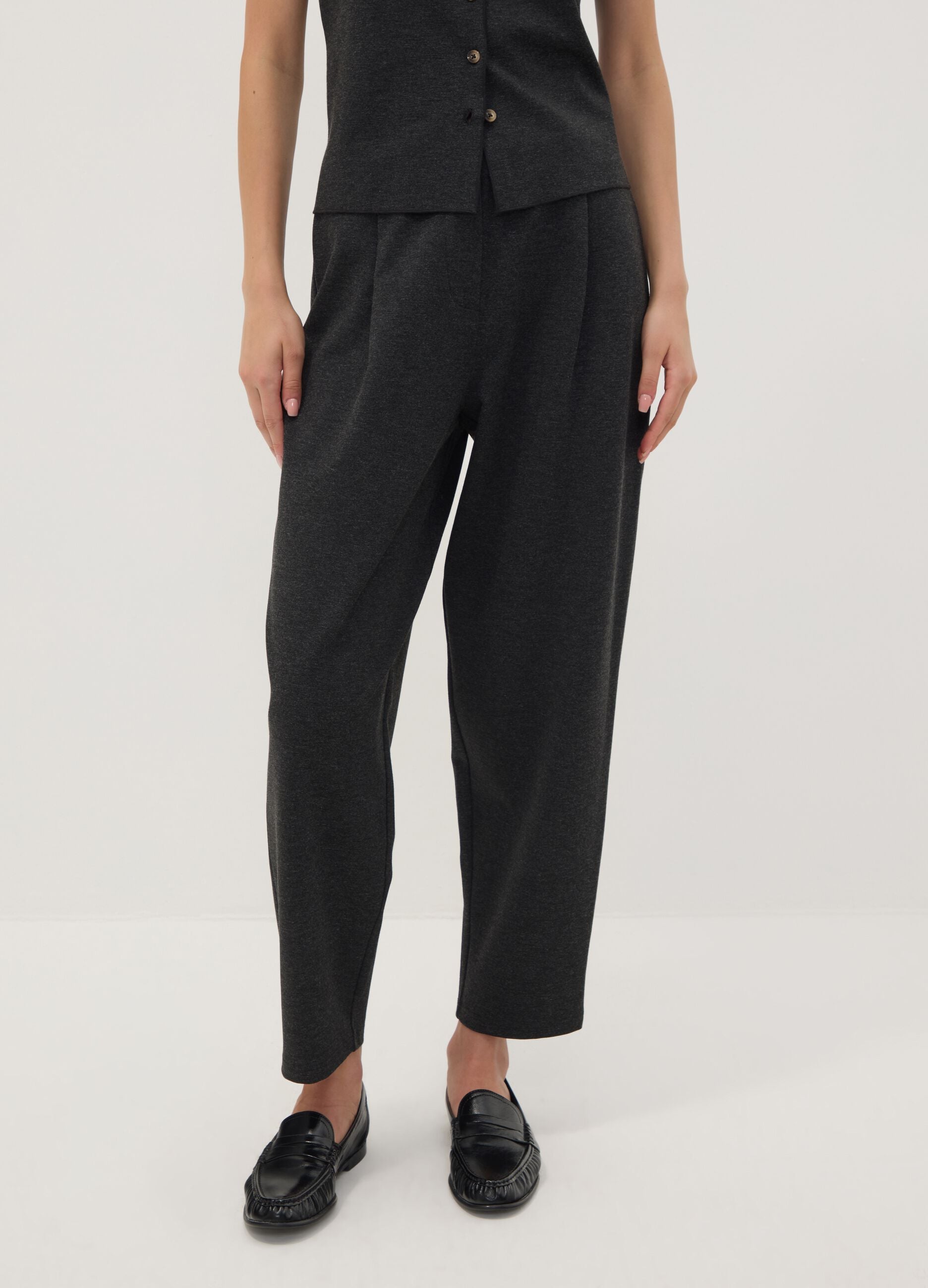 Black Milano-knit jogger trousers in stretch viscose, barrel fit