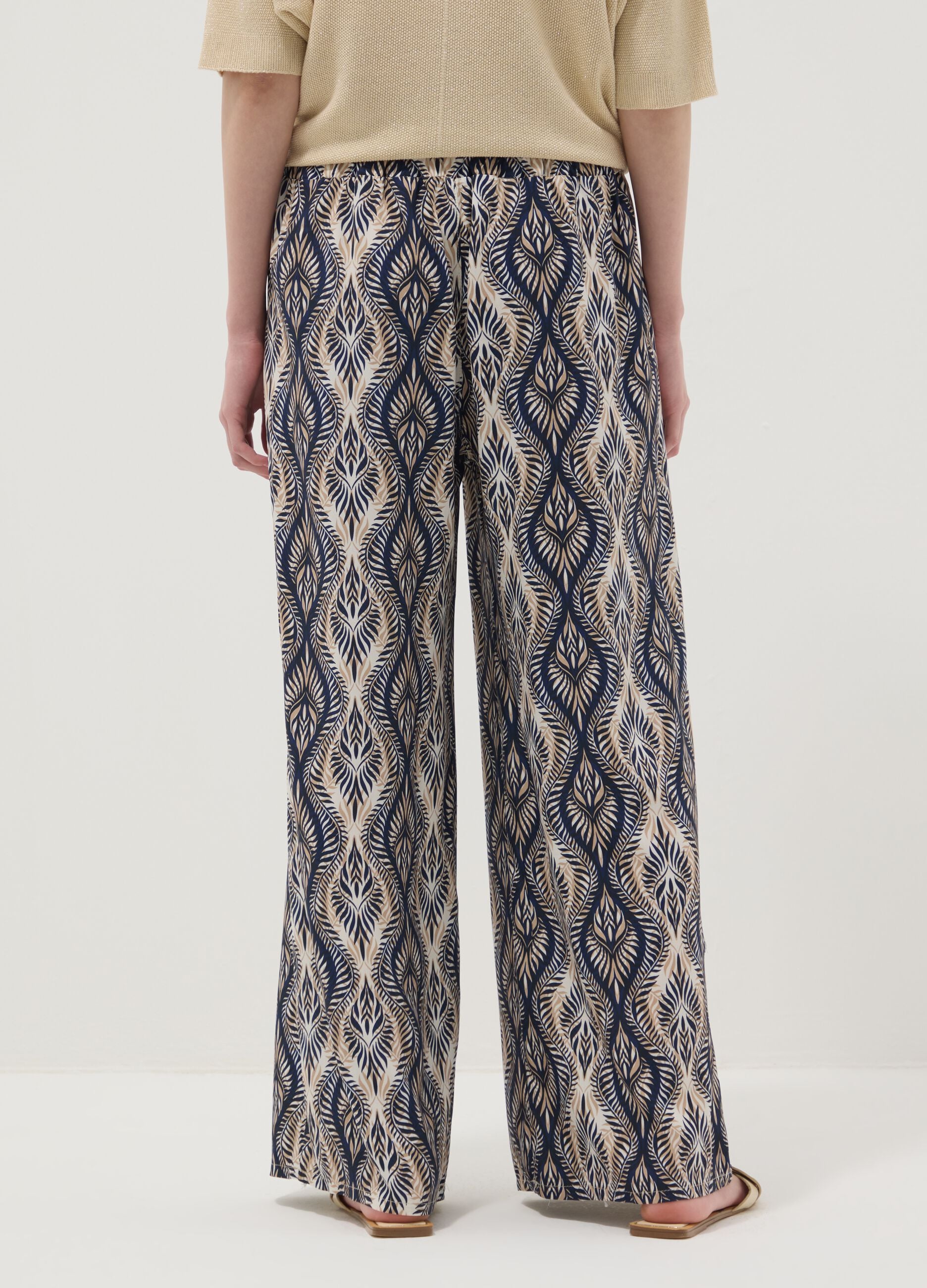 Blue pure-viscose trousers with all-over print, regular fit