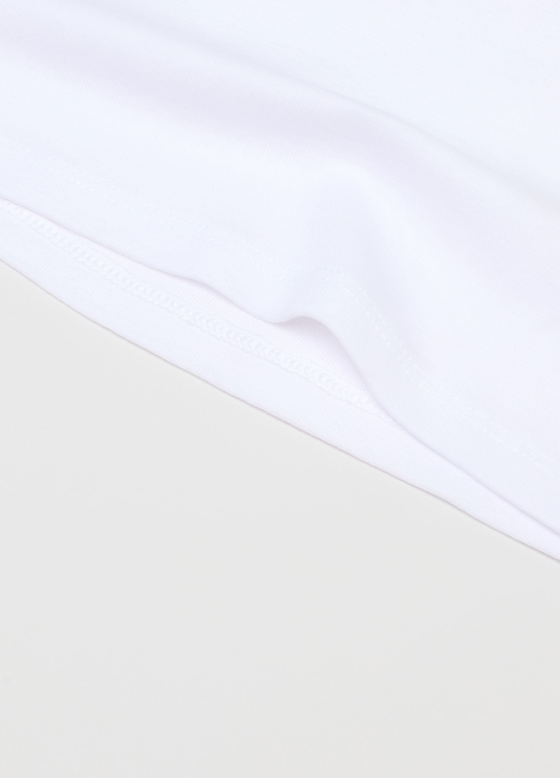 Pack of white sleeveless children's t-shirts in pure cotton regular fit