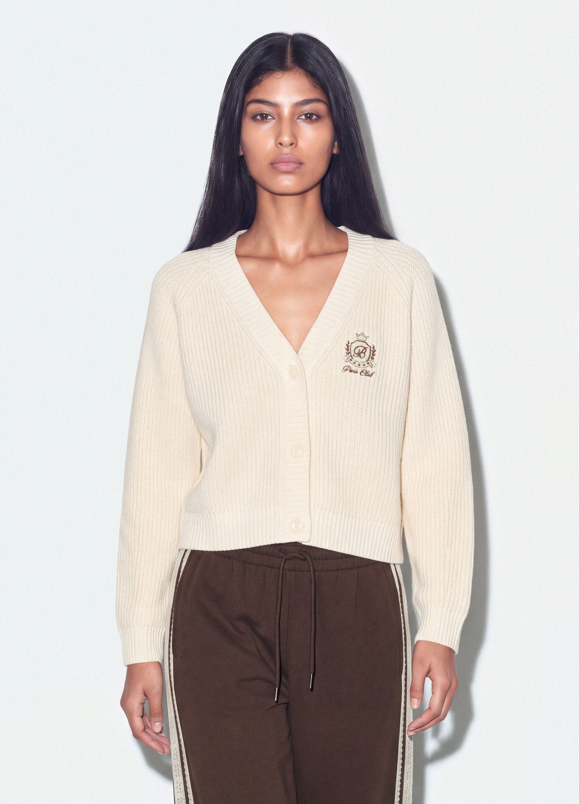 Cardigan beige in misto cotone con scollo profondo a V fitted