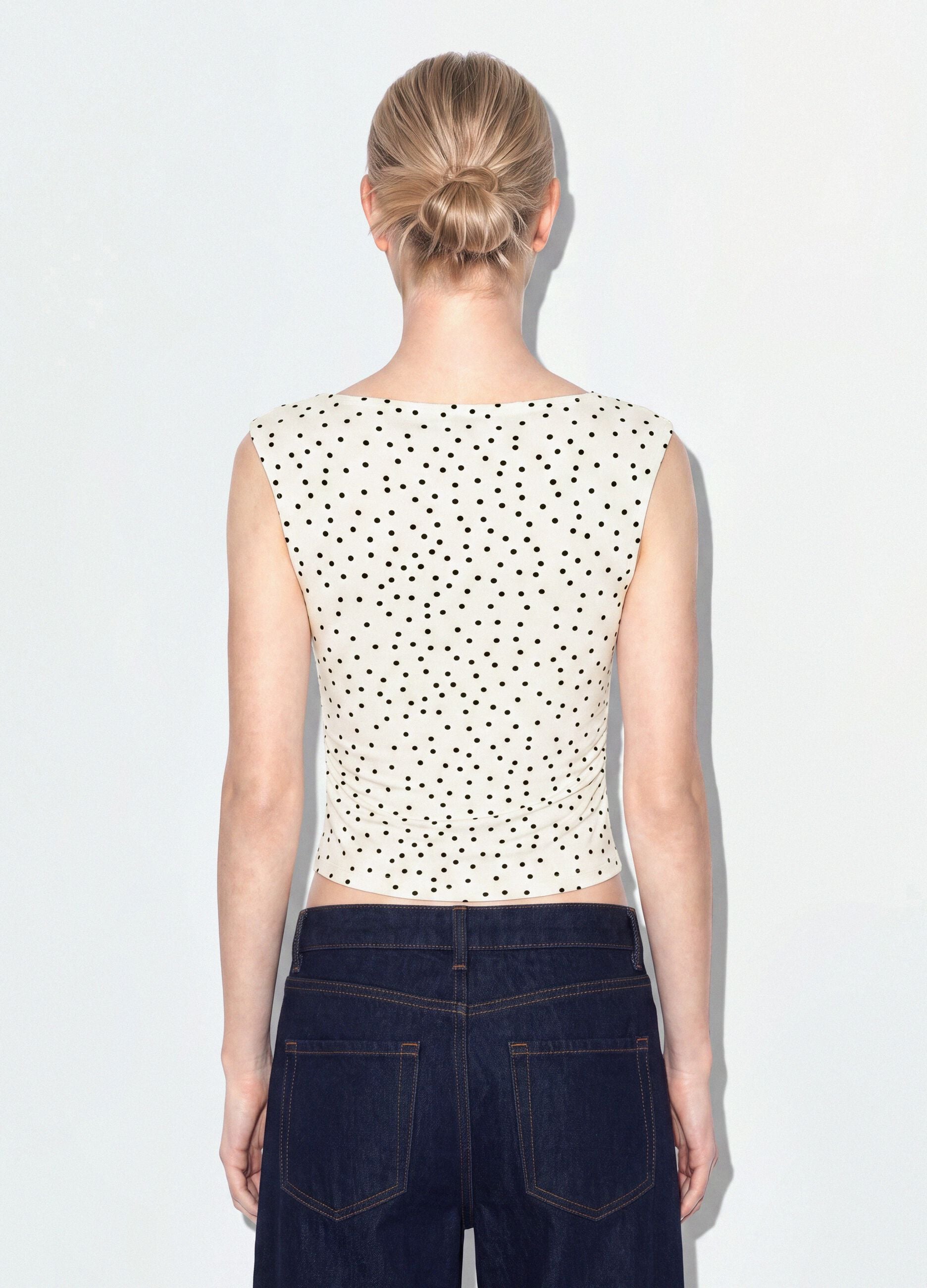 Top bianco asimmetrico monospalla in viscosa elasticizzata a pois slim fit