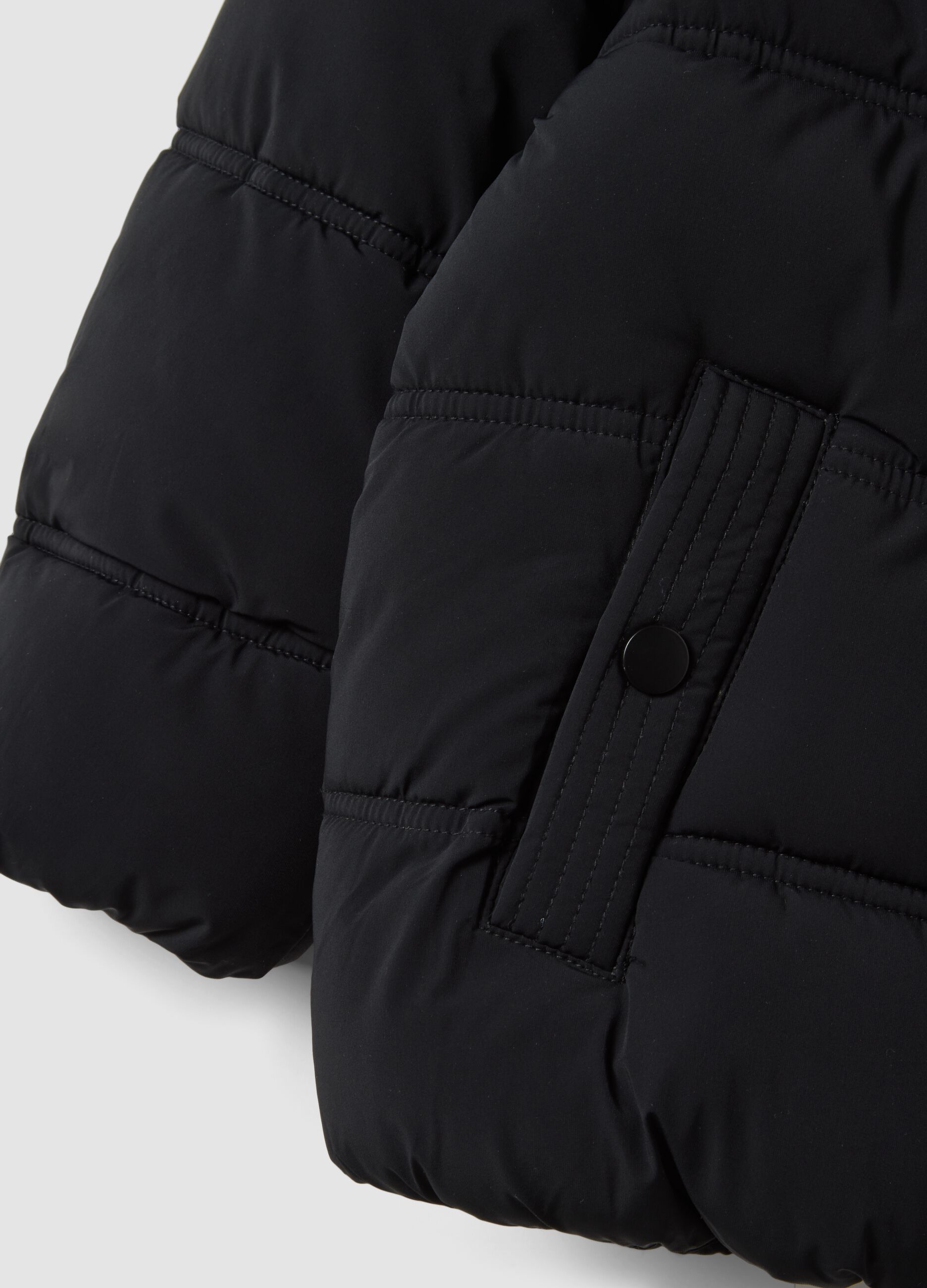 Black padded jacket in stretch fabric