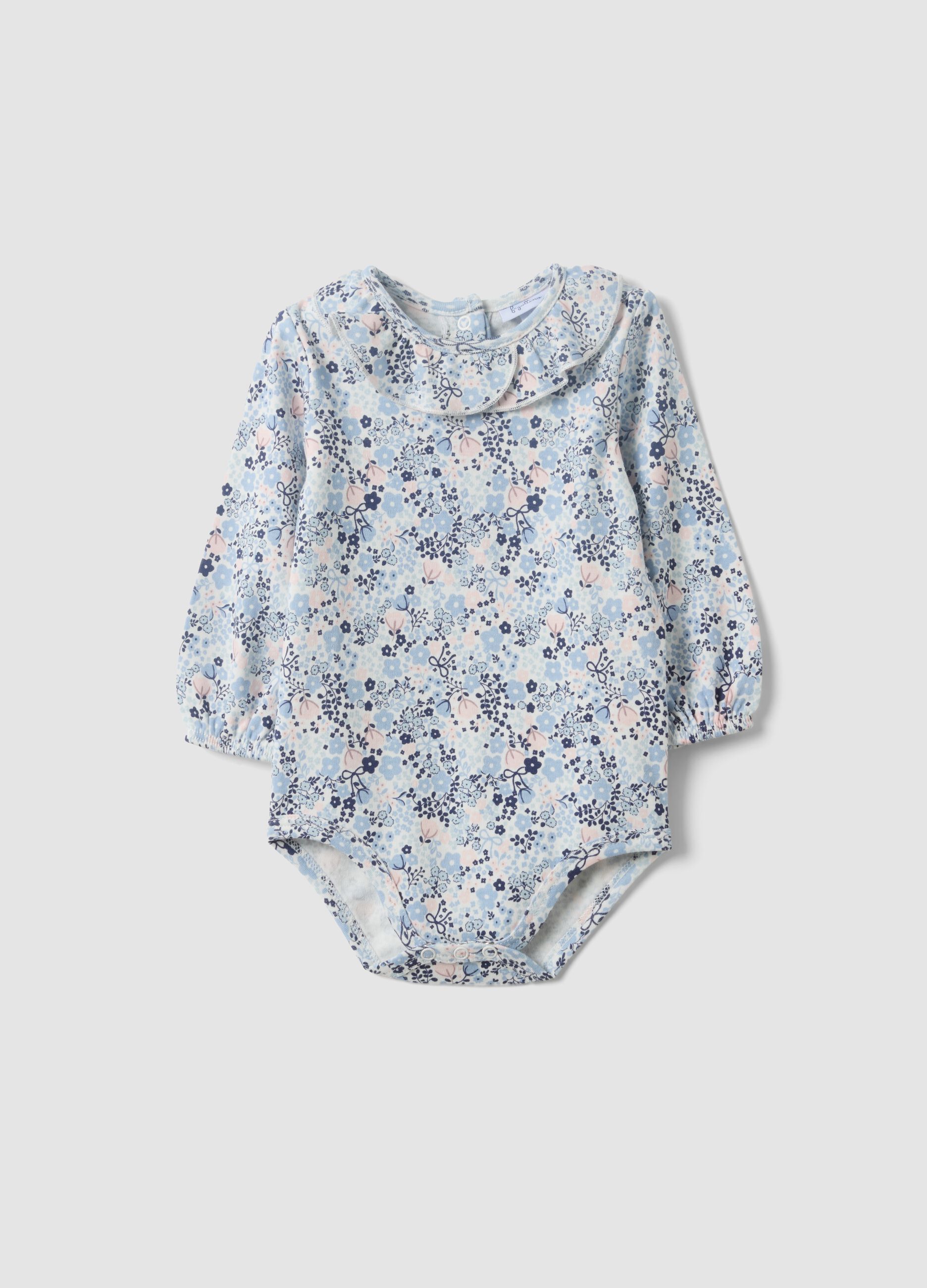 White organic cotton baby girl bodysuit with frill collar and floral print