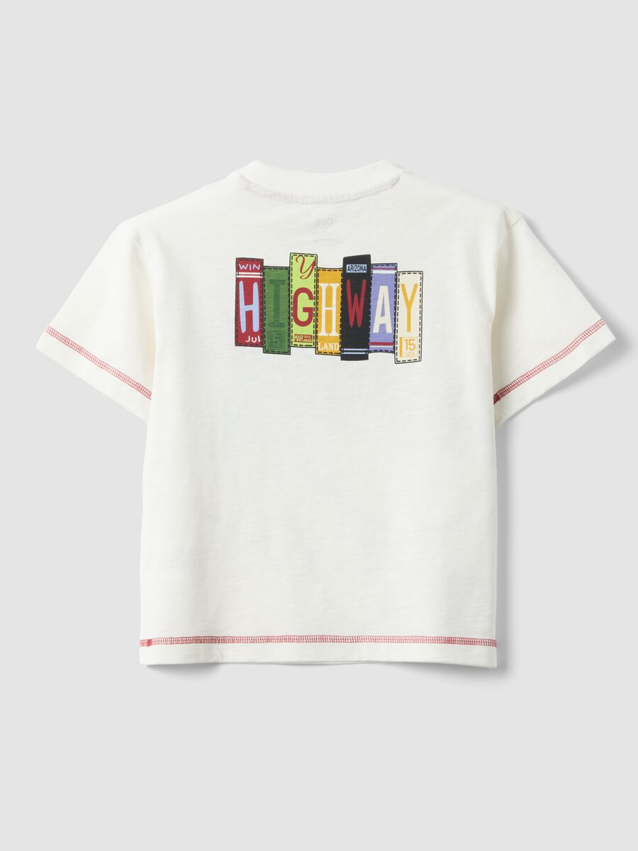 T-shirt in puro cotone bianca da bambina oversize fit con stampa_1