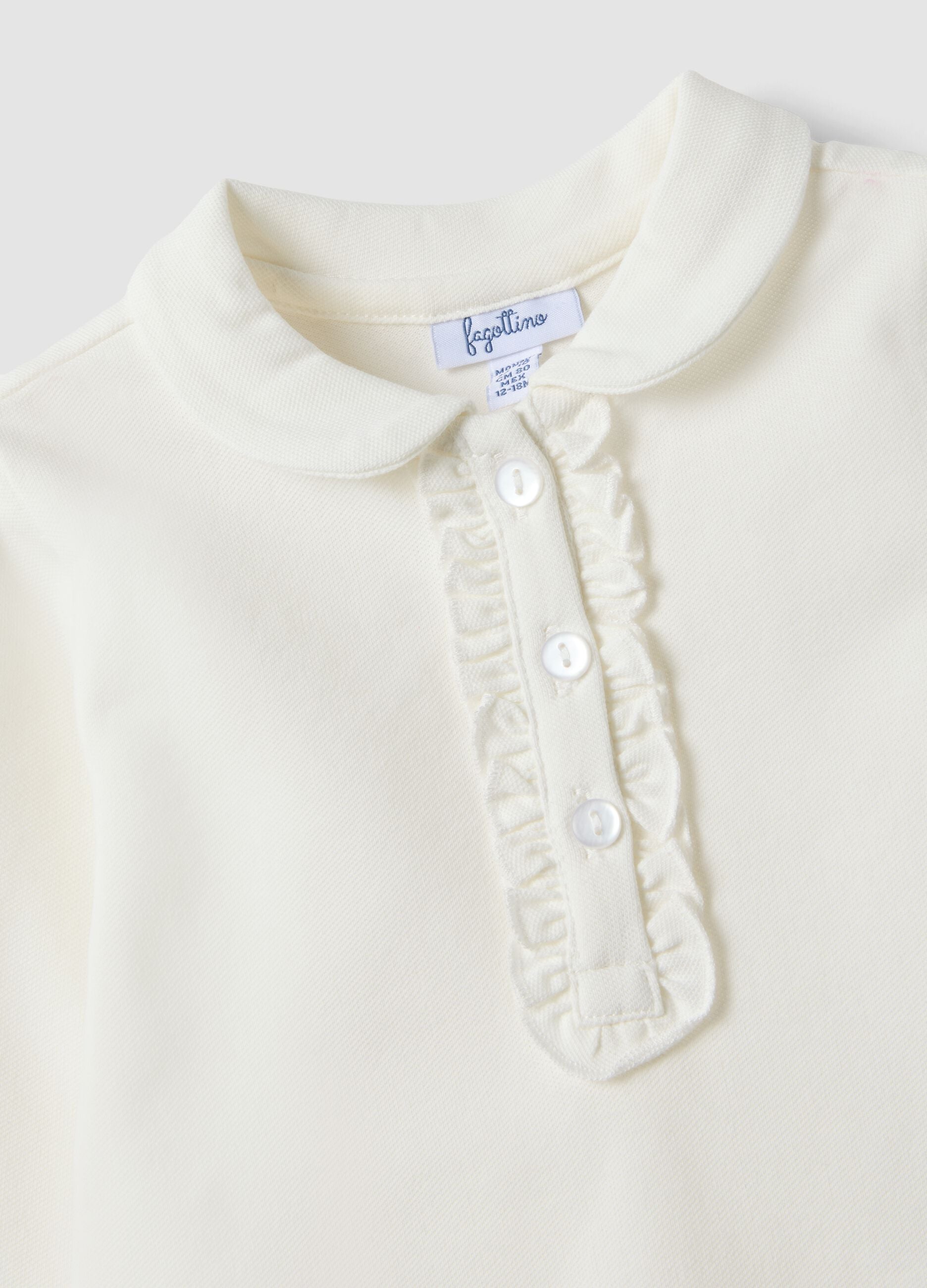 White stretch organic cotton polo shirt with ruffle detailing for baby girl