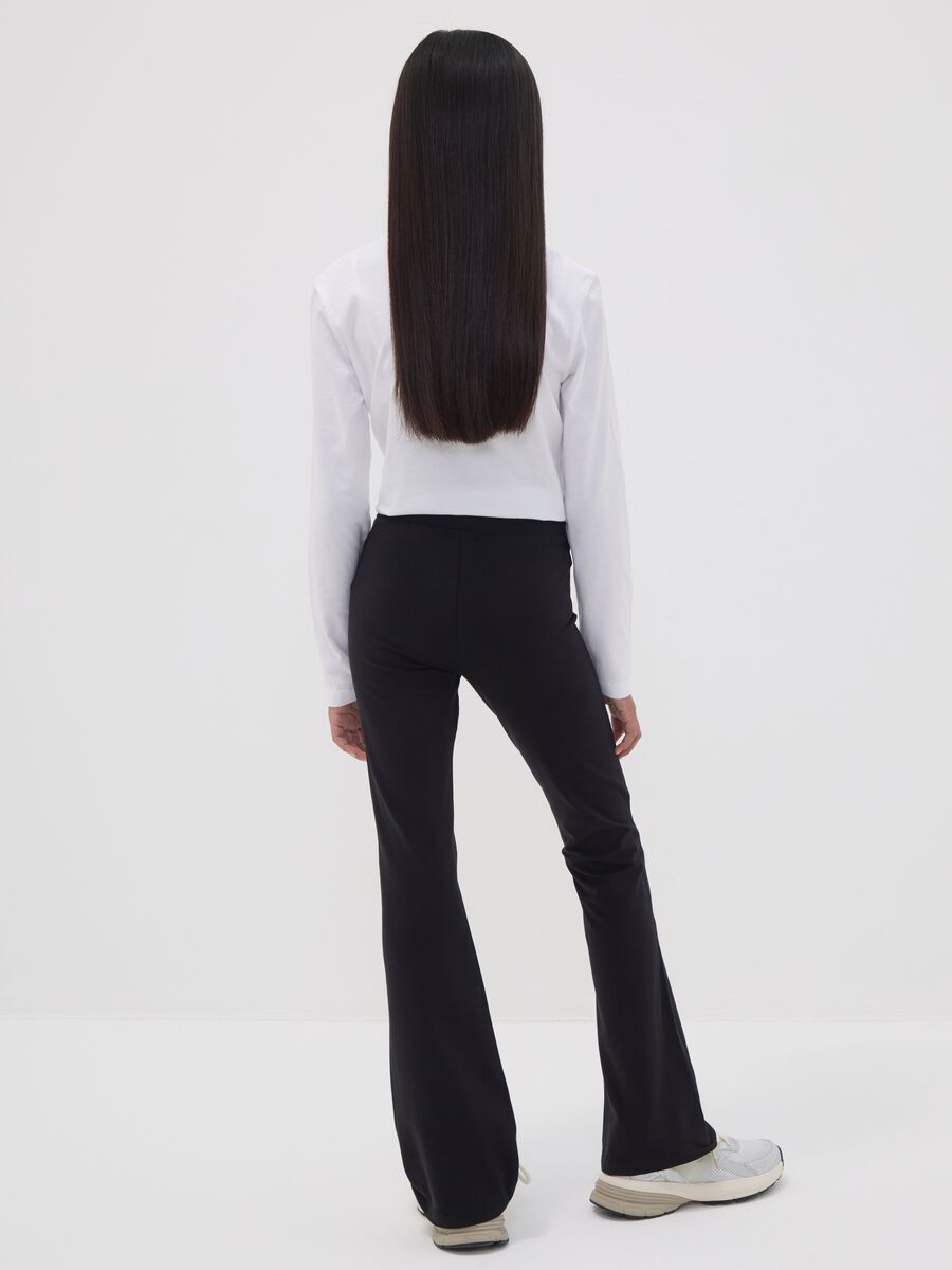 Girls' black flared leggings in stretch organic cotton_1